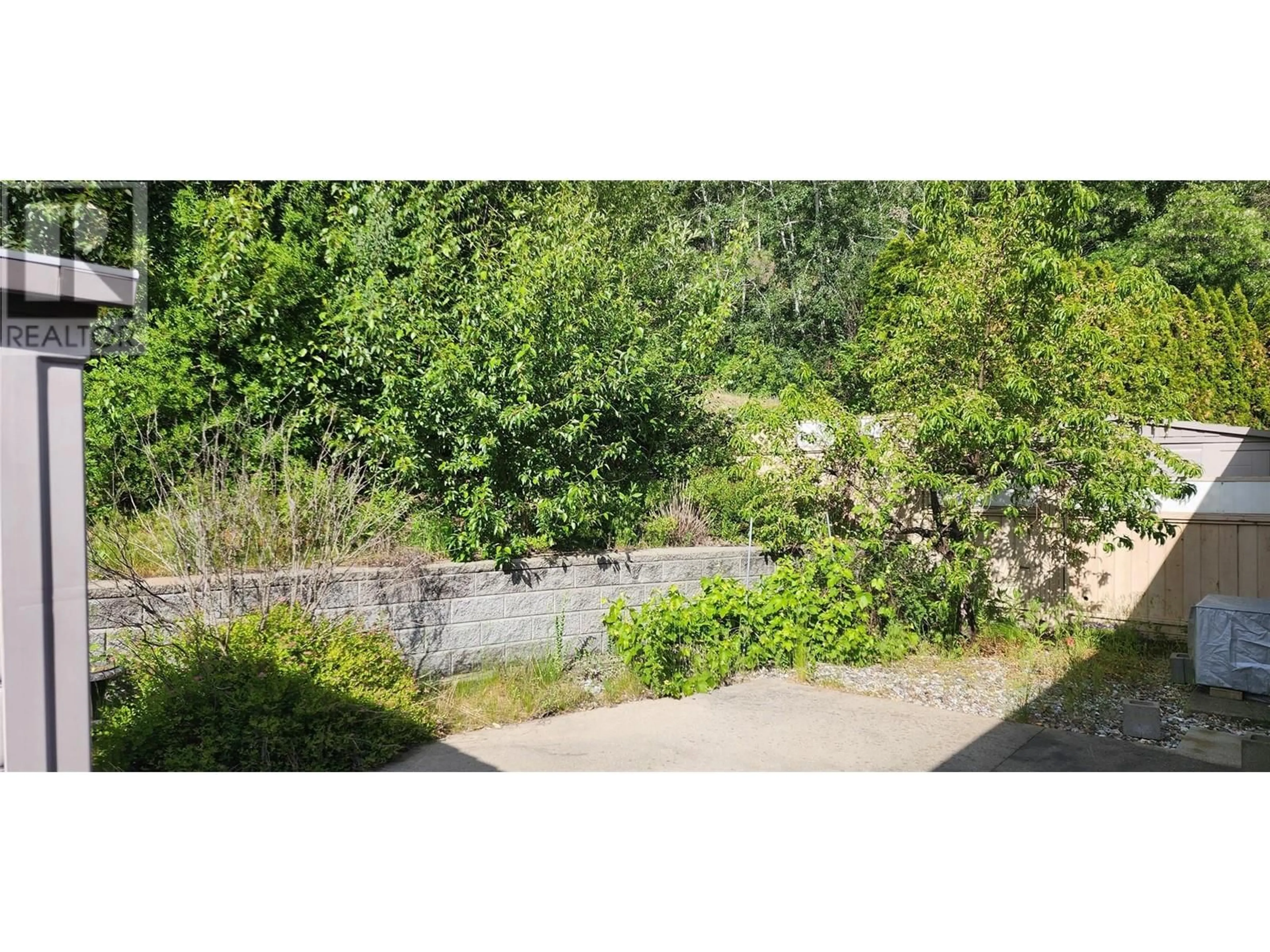 A pic from outside/outdoor area/front of a property/back of a property/a pic from drone, water/lake/river/ocean view for 8160 DEVITO DRIVE, Trail British Columbia V1R4W1
