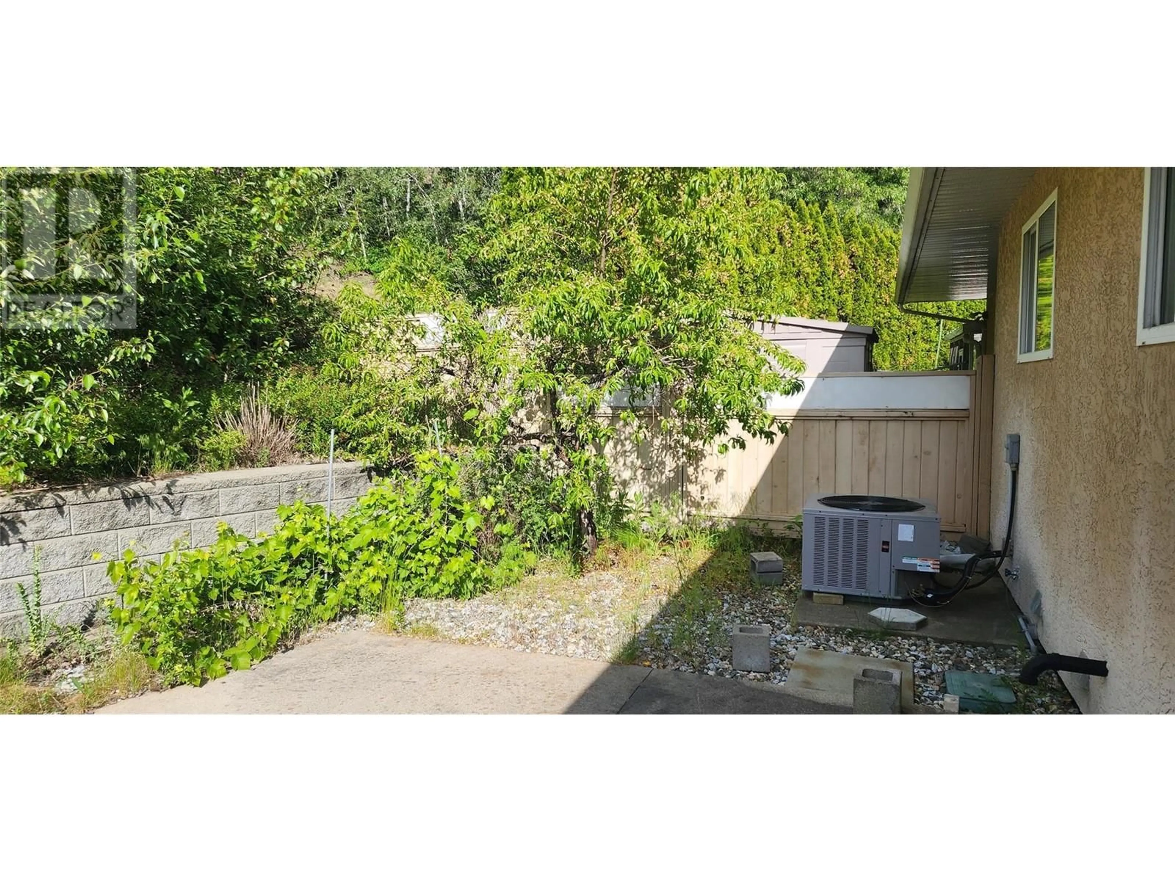 A pic from outside/outdoor area/front of a property/back of a property/a pic from drone, unknown for 8160 DEVITO DRIVE, Trail British Columbia V1R4W1