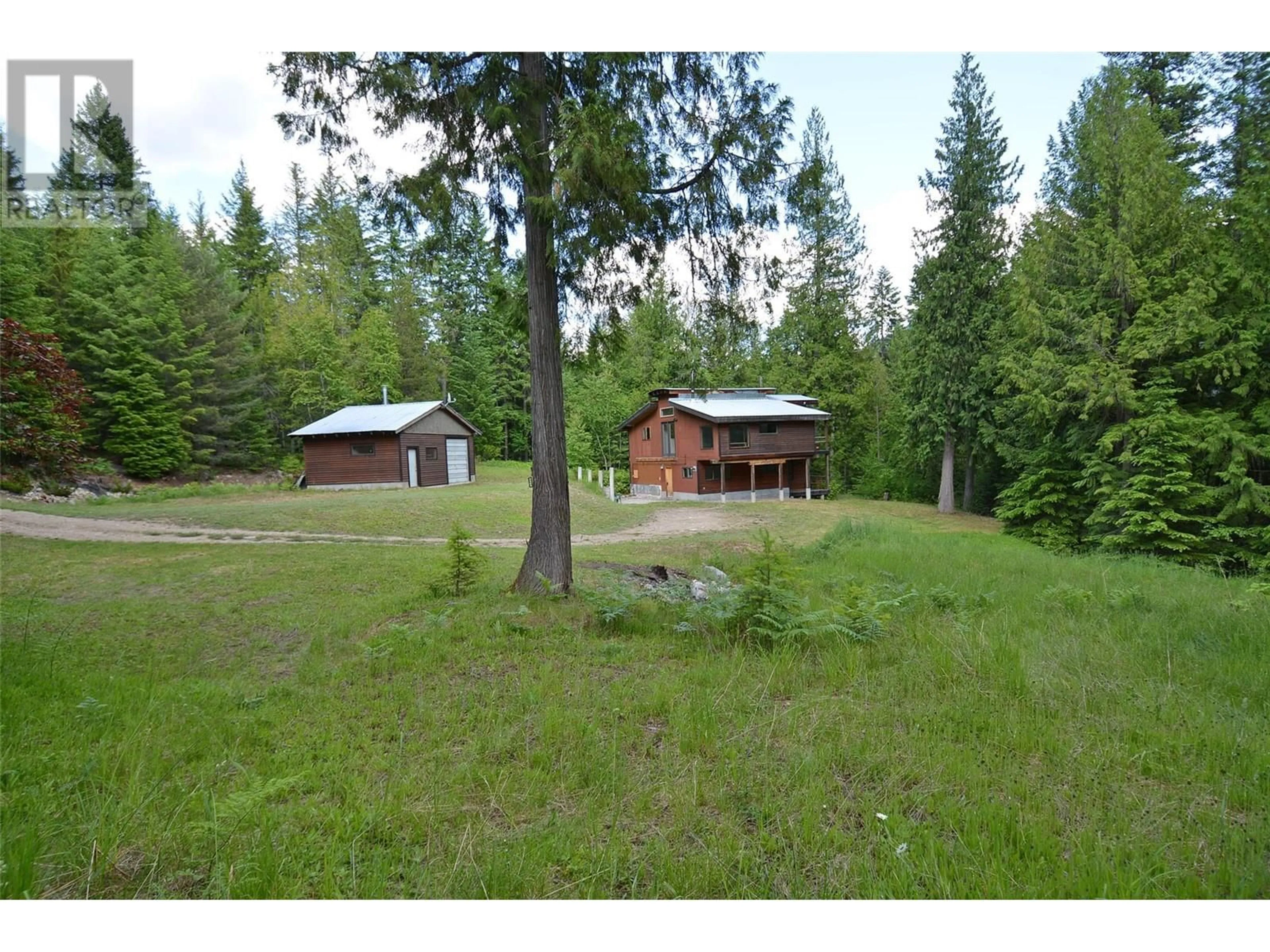 A pic from outside/outdoor area/front of a property/back of a property/a pic from drone, forest/trees view for 4911 SLOCAN RIVER ROAD, Nelson British Columbia V1L2J0
