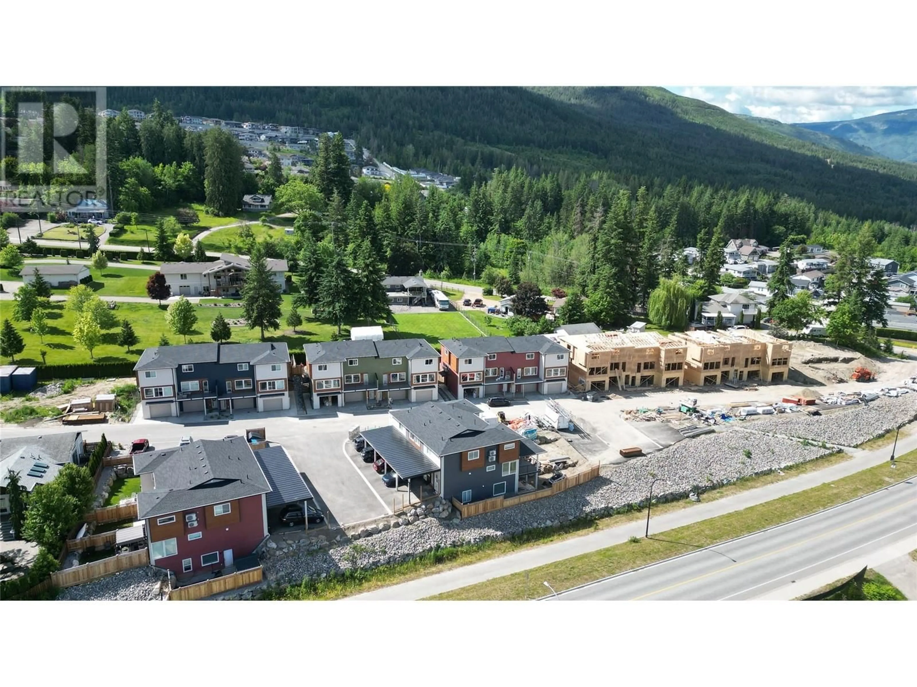A pic from outside/outdoor area/front of a property/back of a property/a pic from drone, mountain view for 38 - 981 12 STREET SOUTHEAST, Salmon Arm British Columbia V1E2C8