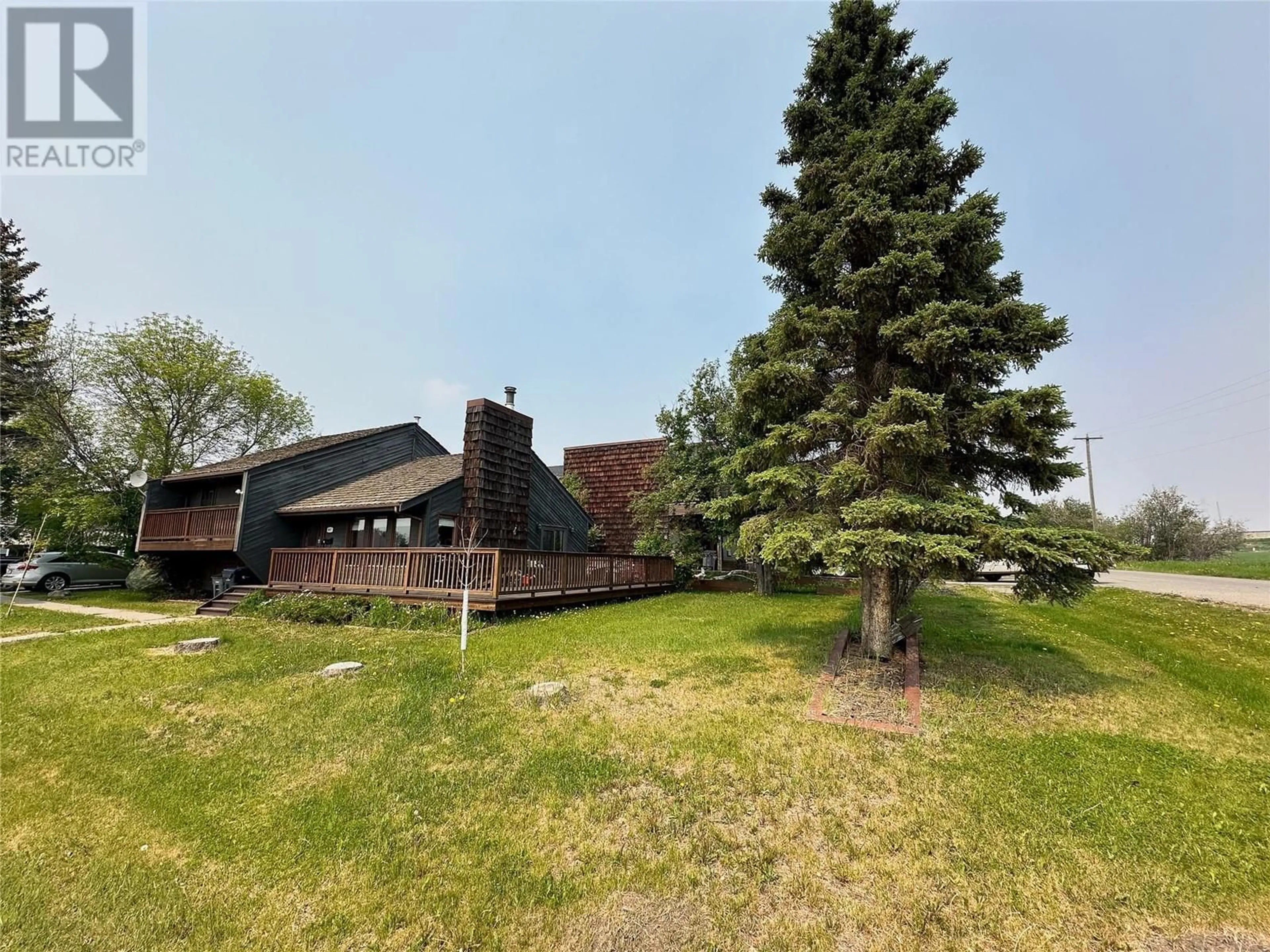 A pic from outside/outdoor area/front of a property/back of a property/a pic from drone, unknown for 9917 2 STREET, Dawson Creek British Columbia V1G3L1