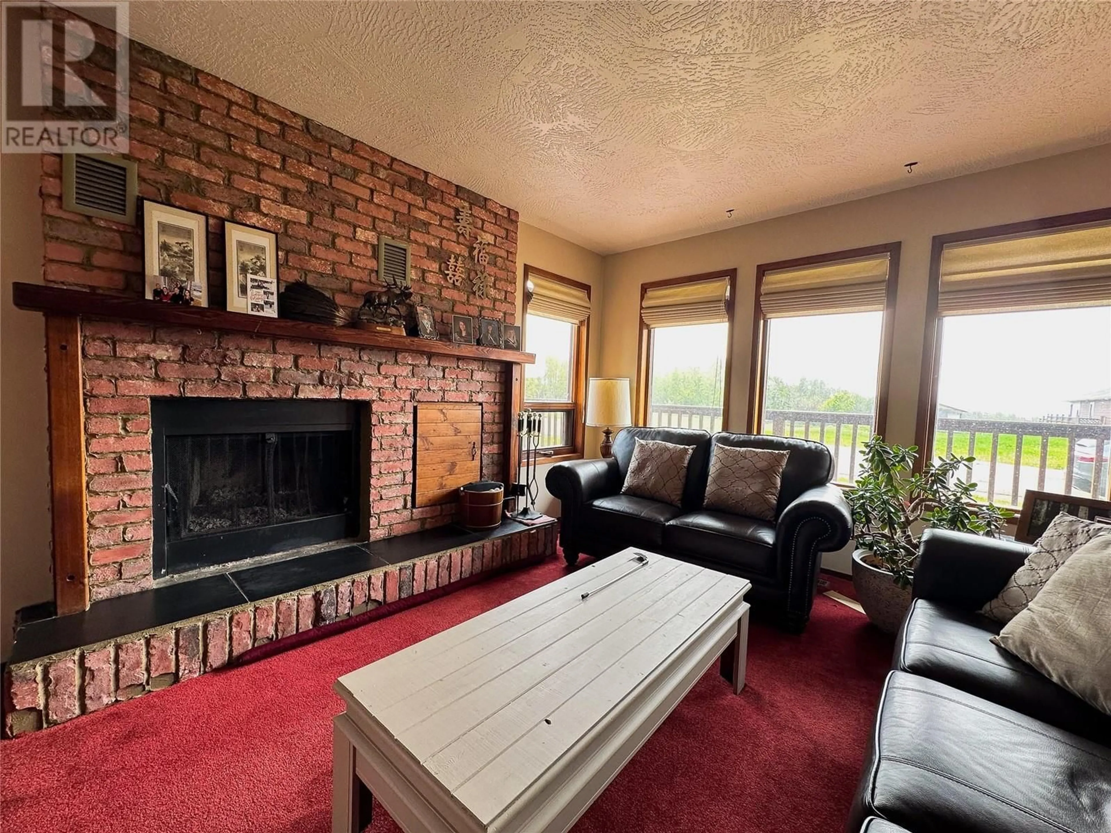 Living room with furniture, unknown for 9917 2 STREET, Dawson Creek British Columbia V1G3L1