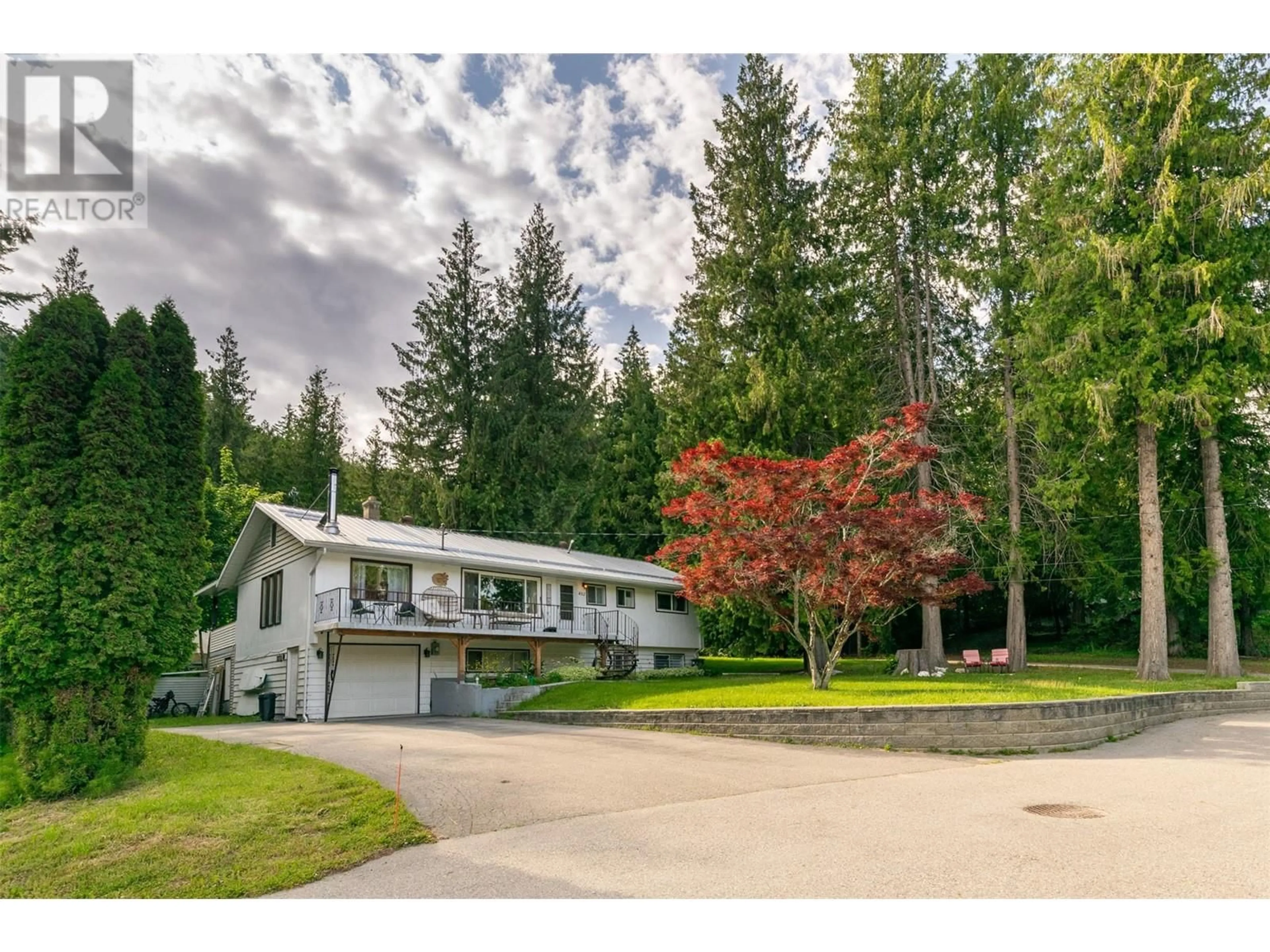 A pic from outside/outdoor area/front of a property/back of a property/a pic from drone, unknown for 402 COACH ROAD, Sicamous British Columbia V0E2V2