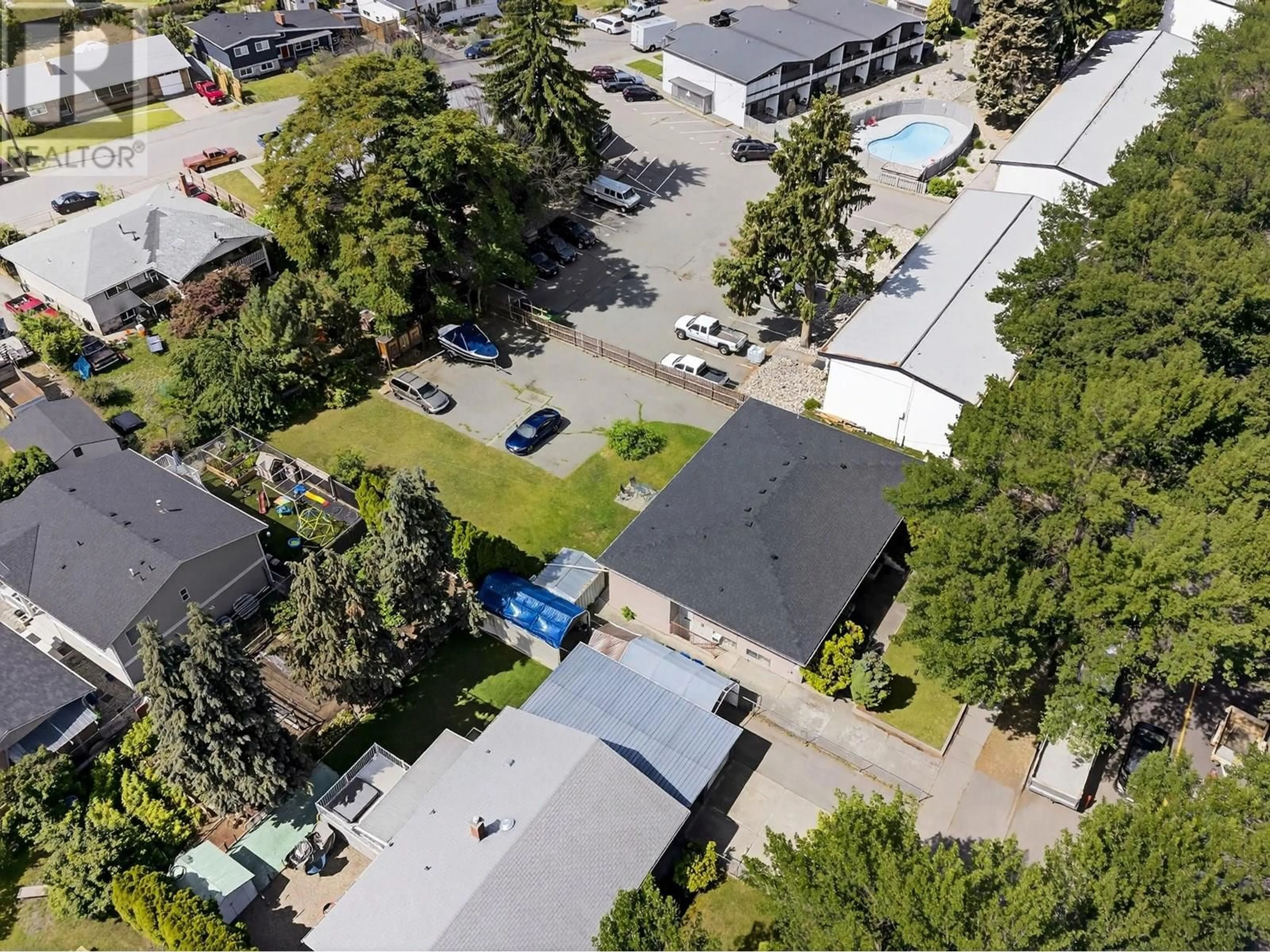 A pic from outside/outdoor area/front of a property/back of a property/a pic from drone, street for 1287-1289 LAWRENCE AVENUE, Kelowna British Columbia V1Y6M5