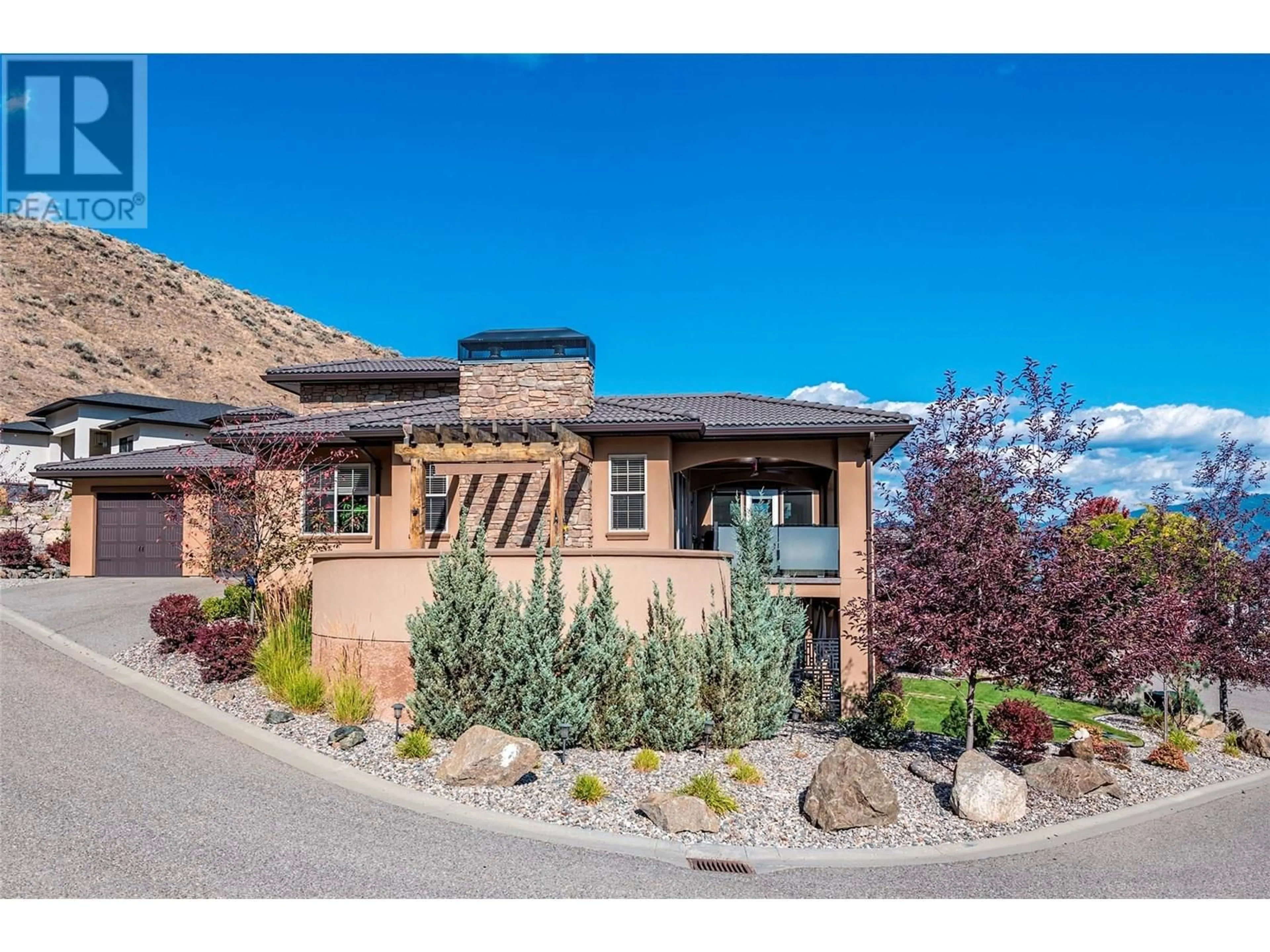 Home with brick exterior material, street for 515 SILVERSAGE PLACE, Vernon British Columbia V1H2J2