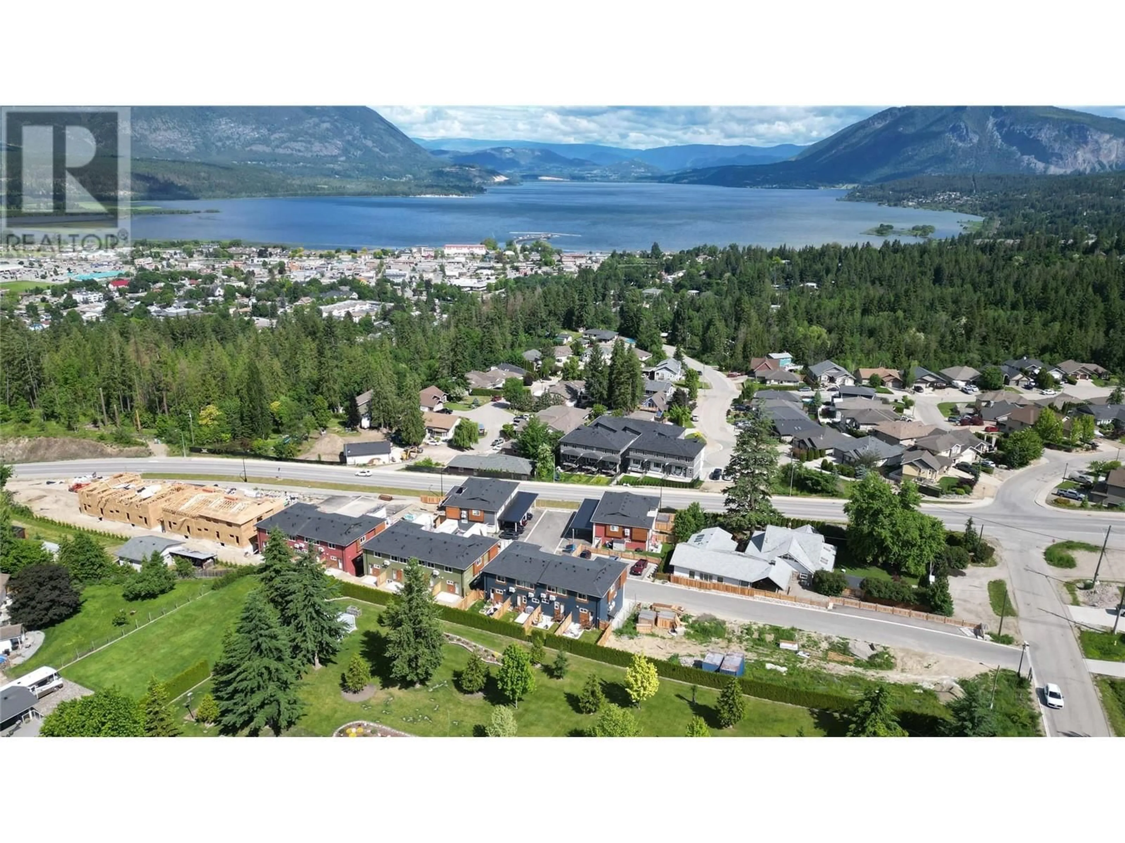 A pic from outside/outdoor area/front of a property/back of a property/a pic from drone, mountain view for 32 - 981 12 STREET SOUTHEAST, Salmon Arm British Columbia V1E2C8