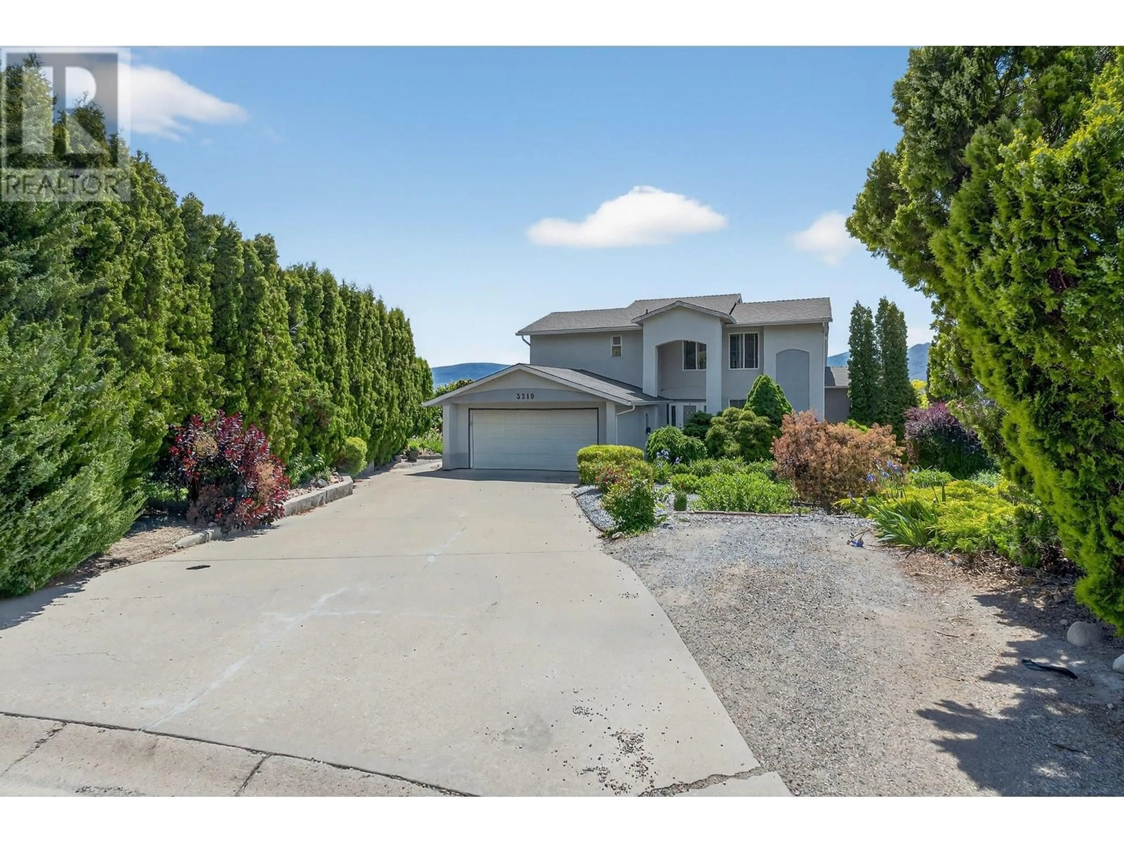 A pic from outside/outdoor area/front of a property/back of a property/a pic from drone, street for 3219 SAGEBRUSH COURT, West Kelowna British Columbia V4T2G6
