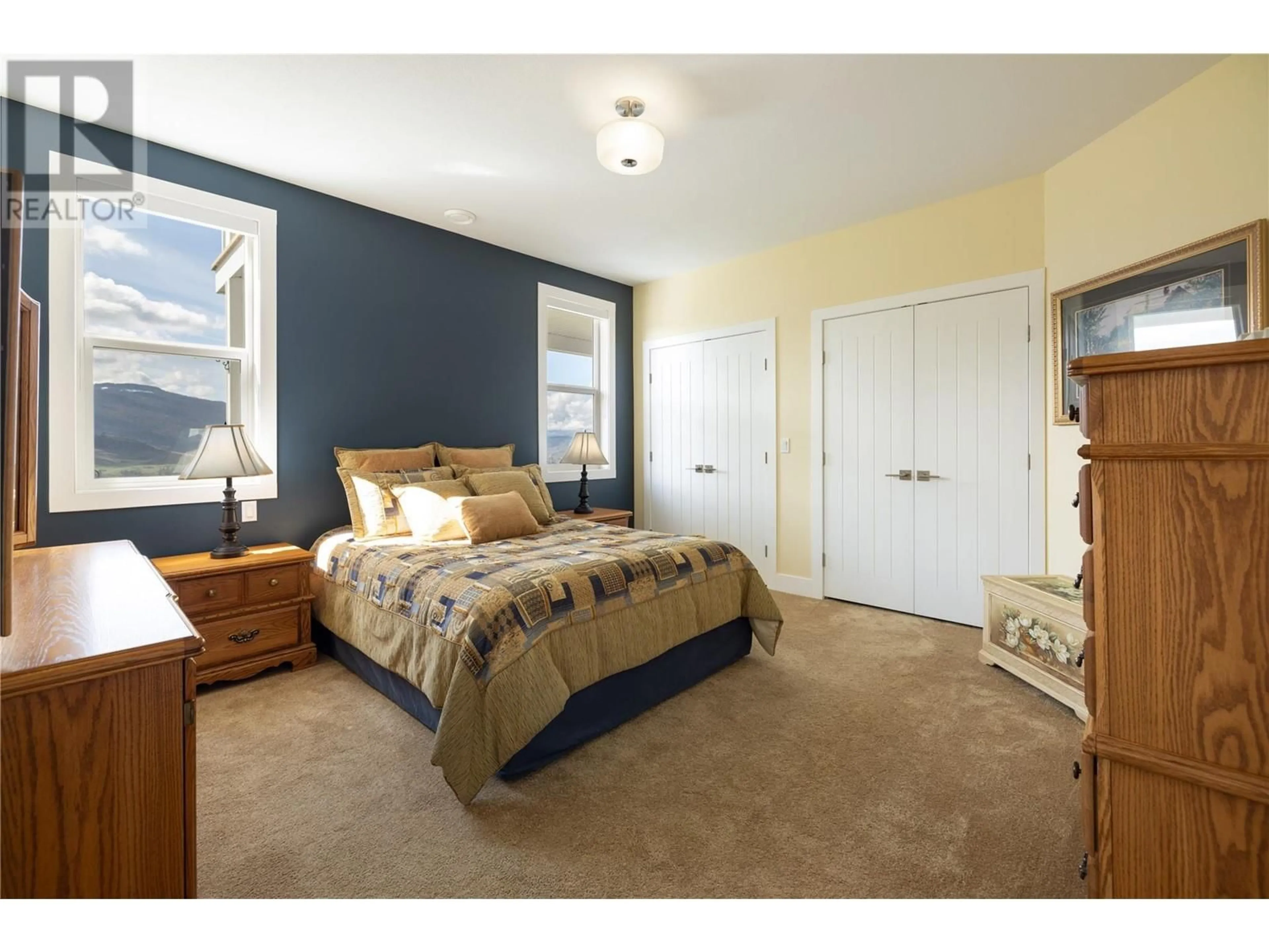 Bedroom with bed, carpet floor for 98 RANCHLAND PLACE, Coldstream British Columbia V1B4C9