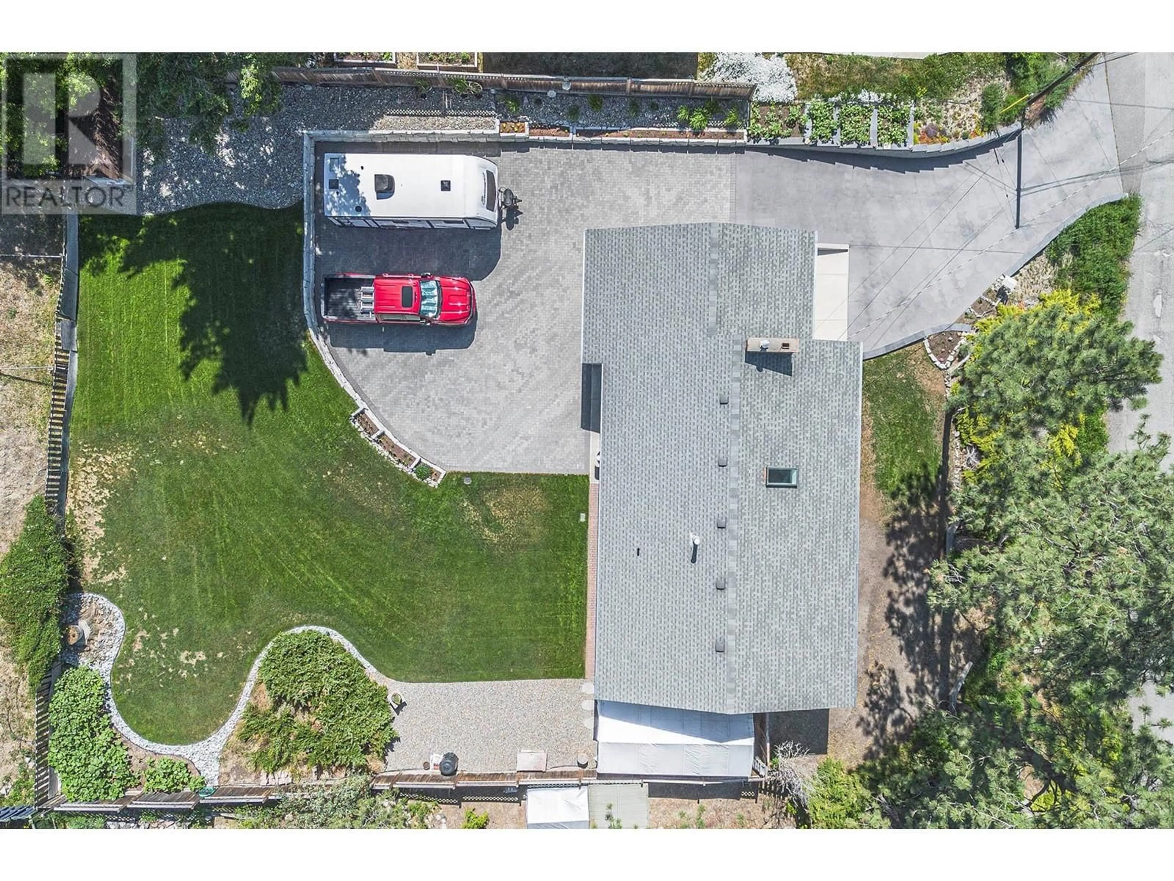 A pic from outside/outdoor area/front of a property/back of a property/a pic from drone, street for 1206 HIGHRIDGE DRIVE, Kamloops British Columbia V2C5G6