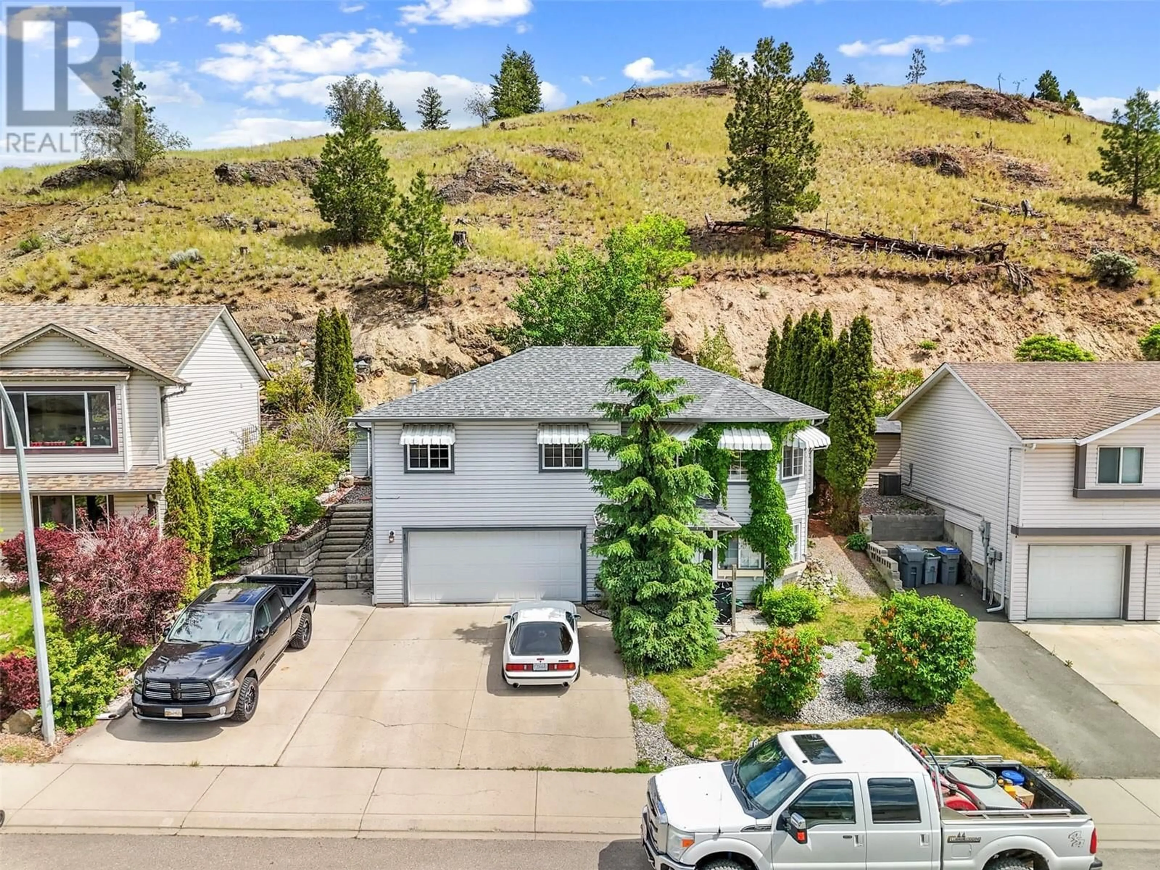 A pic from outside/outdoor area/front of a property/back of a property/a pic from drone, mountain view for 1368 SUNSHINE COURT, Kamloops British Columbia V2E2P9