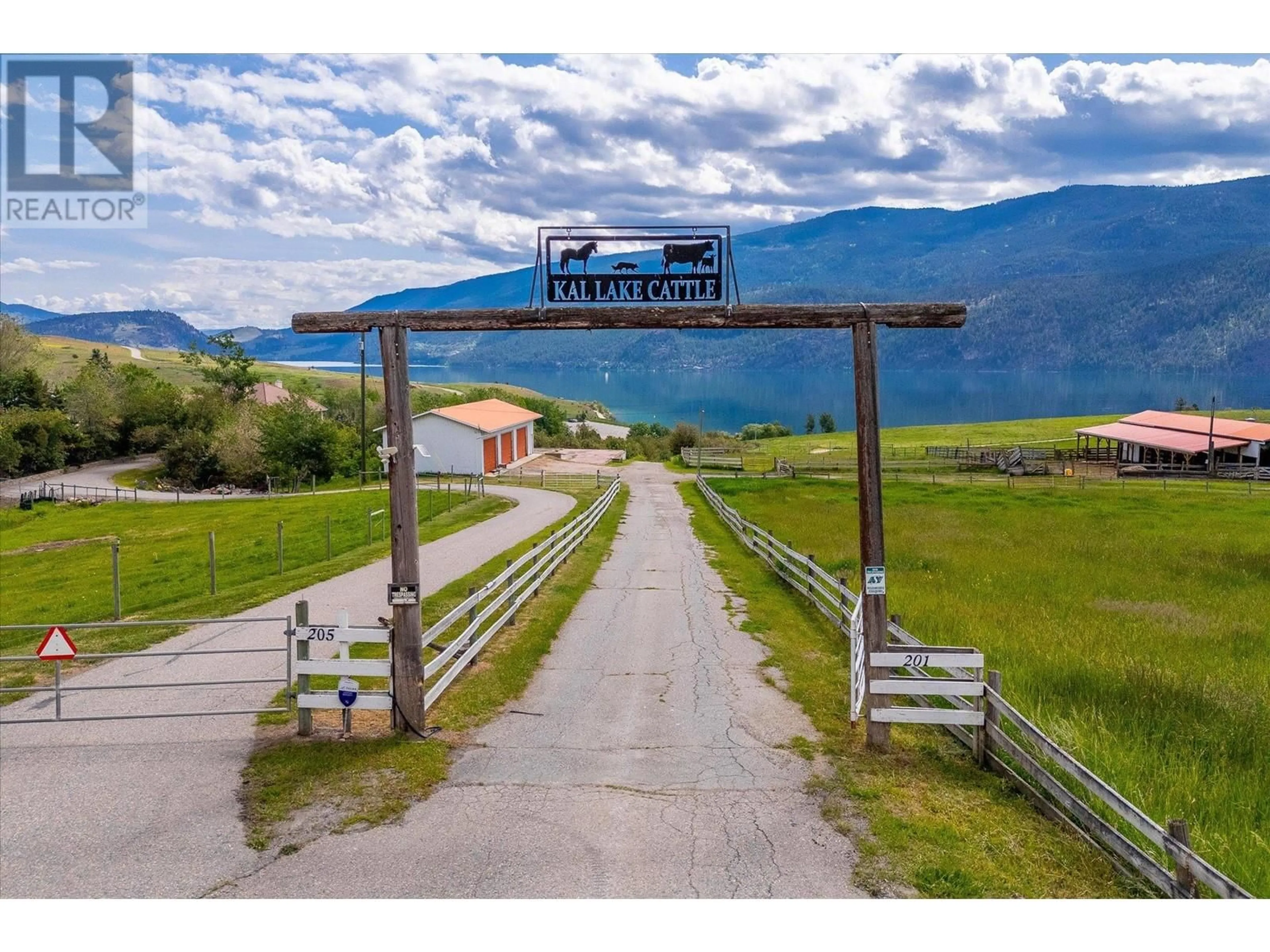 A pic from outside/outdoor area/front of a property/back of a property/a pic from drone, mountain view for 201 HIGHWAY 97 OTHER, Vernon British Columbia V1H1G1