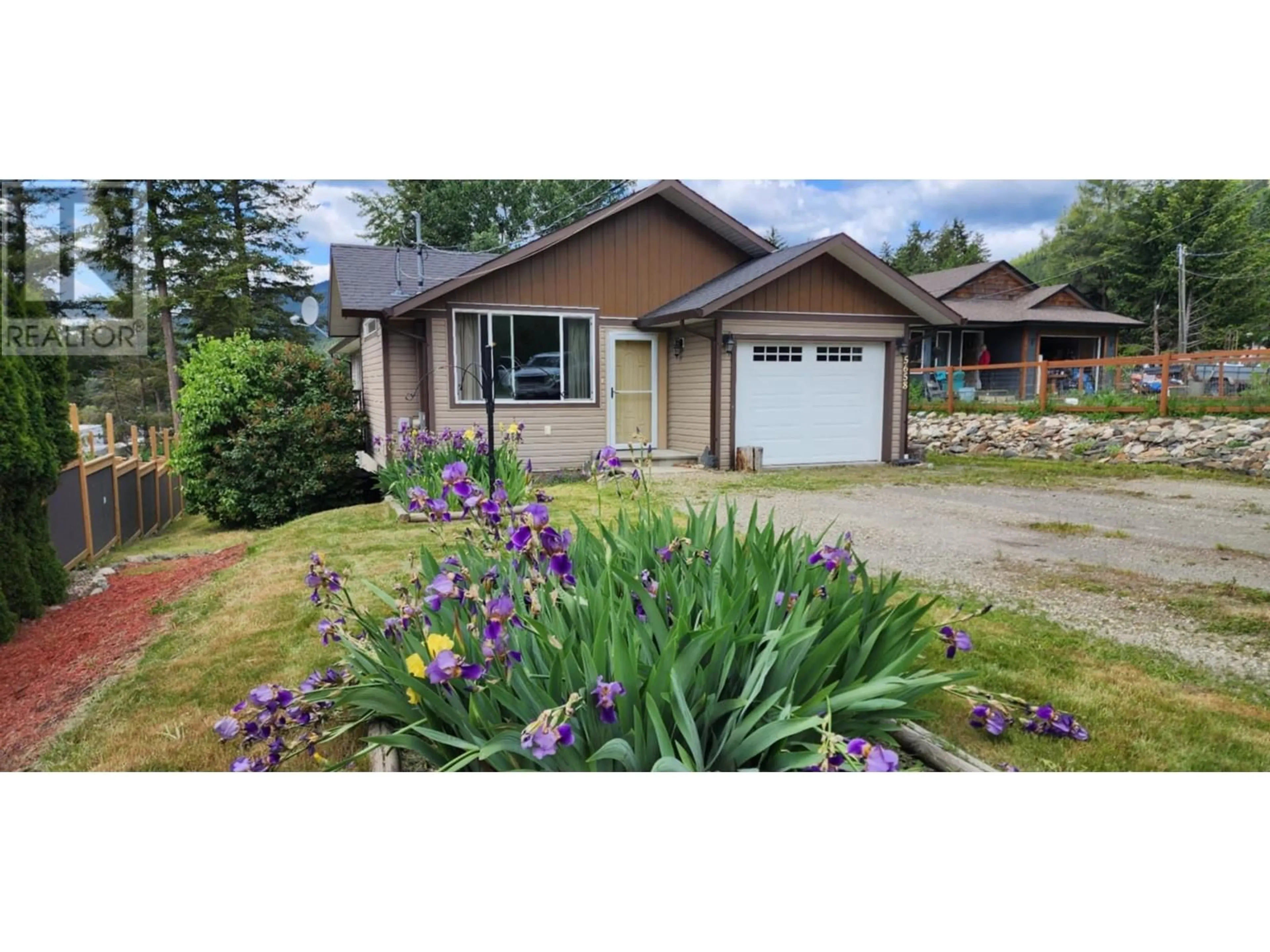 A pic from outside/outdoor area/front of a property/back of a property/a pic from drone, street for 5658 LYNES ROAD, Falkland British Columbia V0E1W0