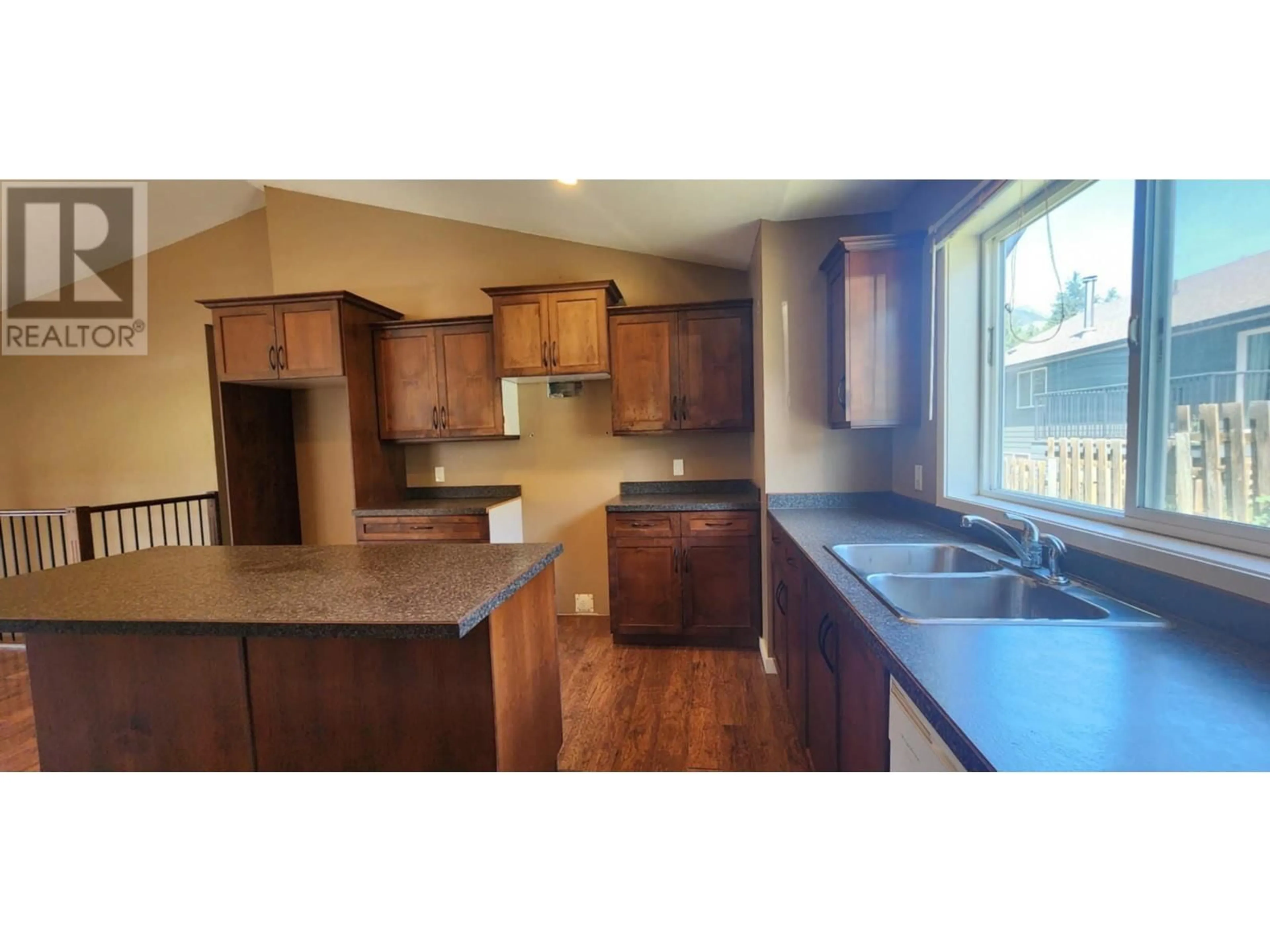 Open concept kitchen, wood/laminate floor for 5658 LYNES ROAD, Falkland British Columbia V0E1W0