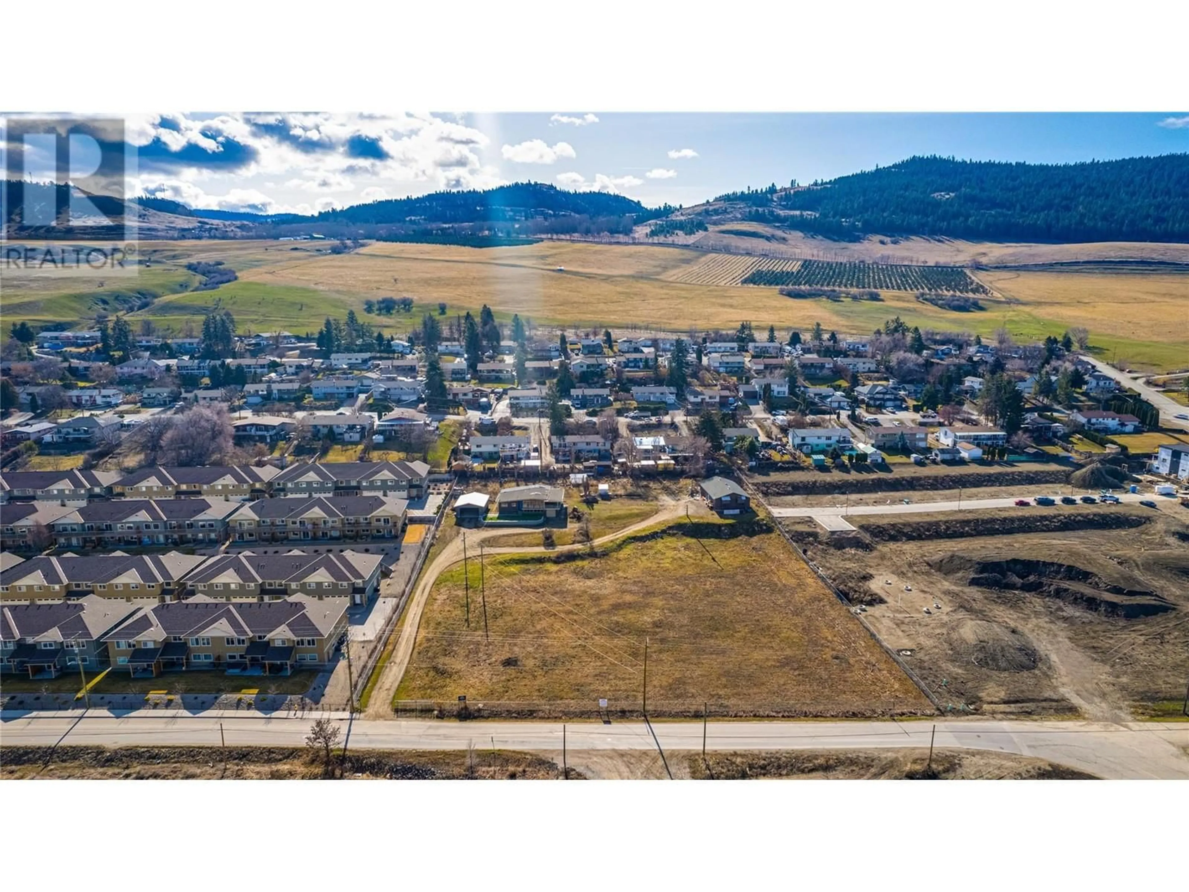A pic from outside/outdoor area/front of a property/back of a property/a pic from drone, mountain view for 6650 OKANAGAN AVENUE, Vernon British Columbia V1H1M2
