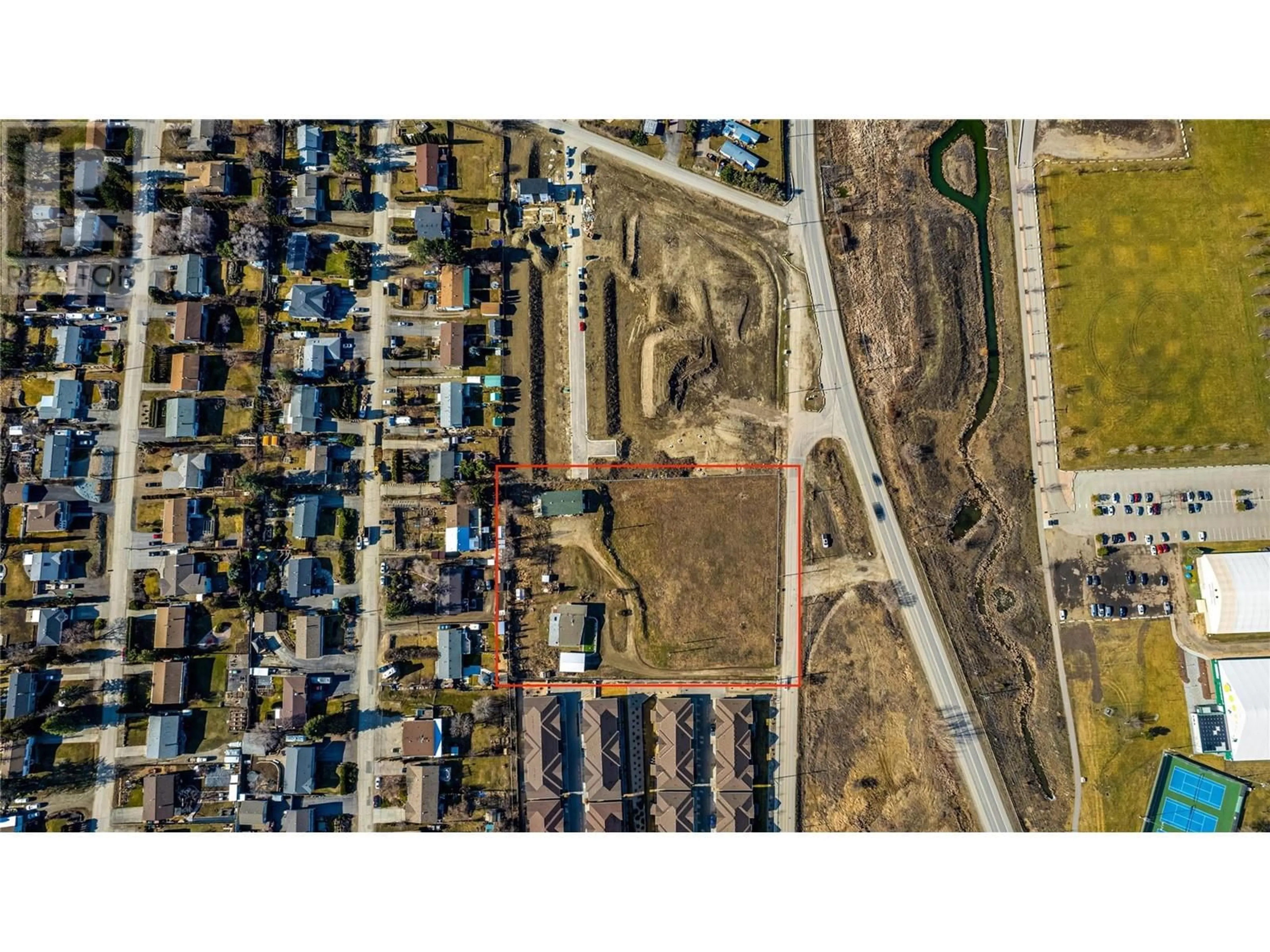 A pic from outside/outdoor area/front of a property/back of a property/a pic from drone, street for 6650 OKANAGAN AVENUE, Vernon British Columbia V1H1M2