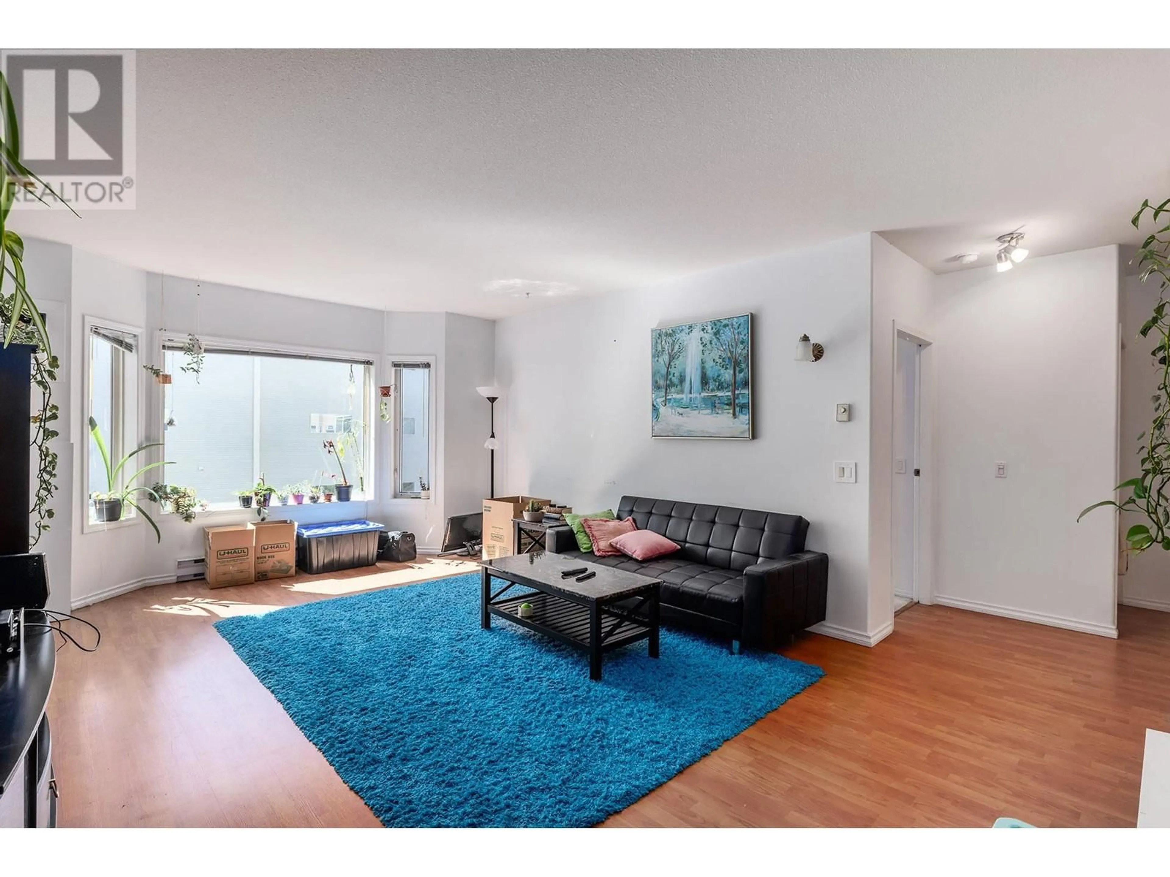 Living room with furniture, unknown for 214 - 985 KLO ROAD, Kelowna British Columbia V1Y9L2