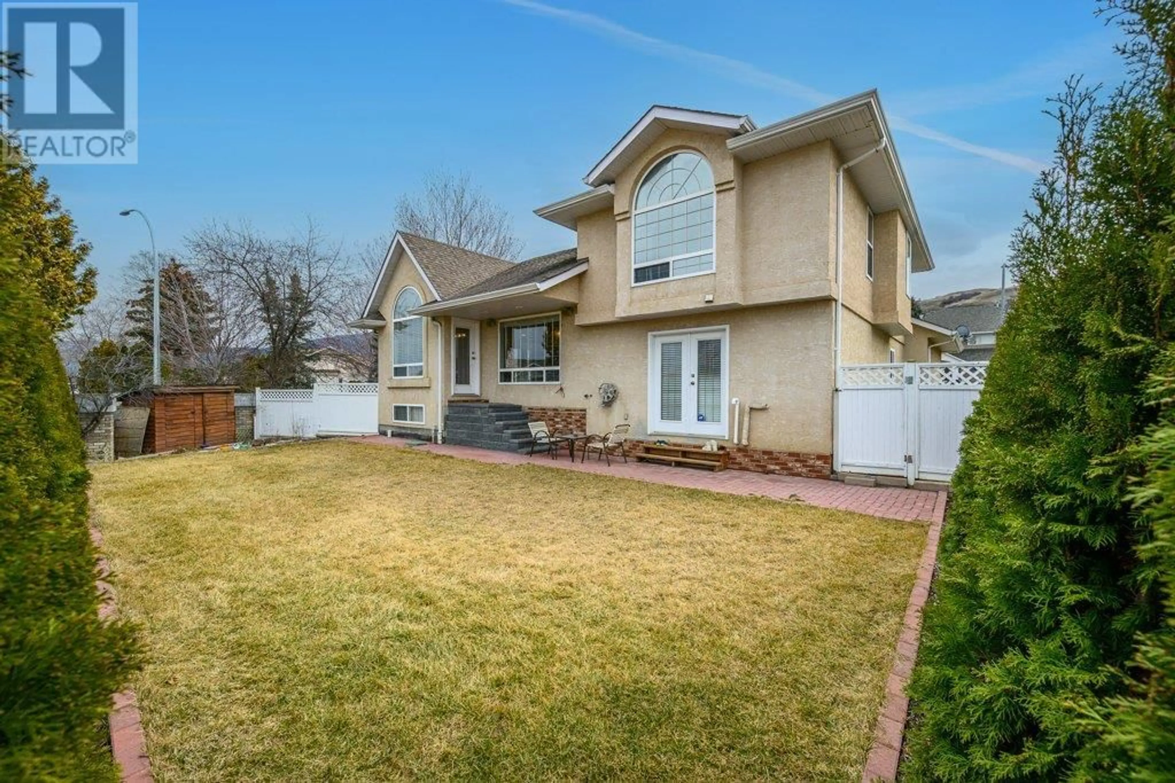 Home with vinyl exterior material, street for 974 MT. BEAVEN PLACE, Vernon British Columbia V1B2Y8