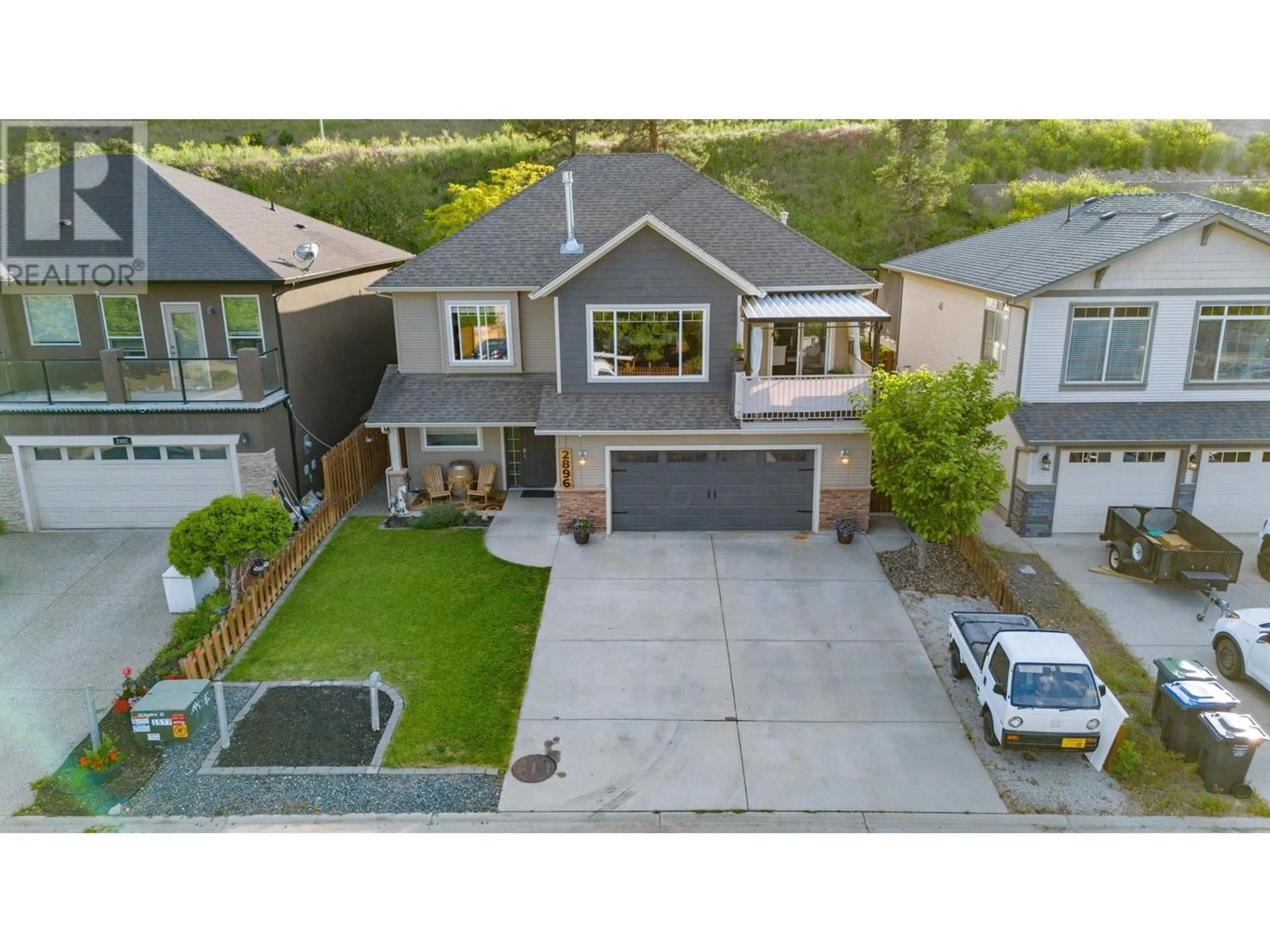 A pic from outside/outdoor area/front of a property/back of a property/a pic from drone, street for 2896 BENTLEY ROAD, West Kelowna British Columbia V4T3B3