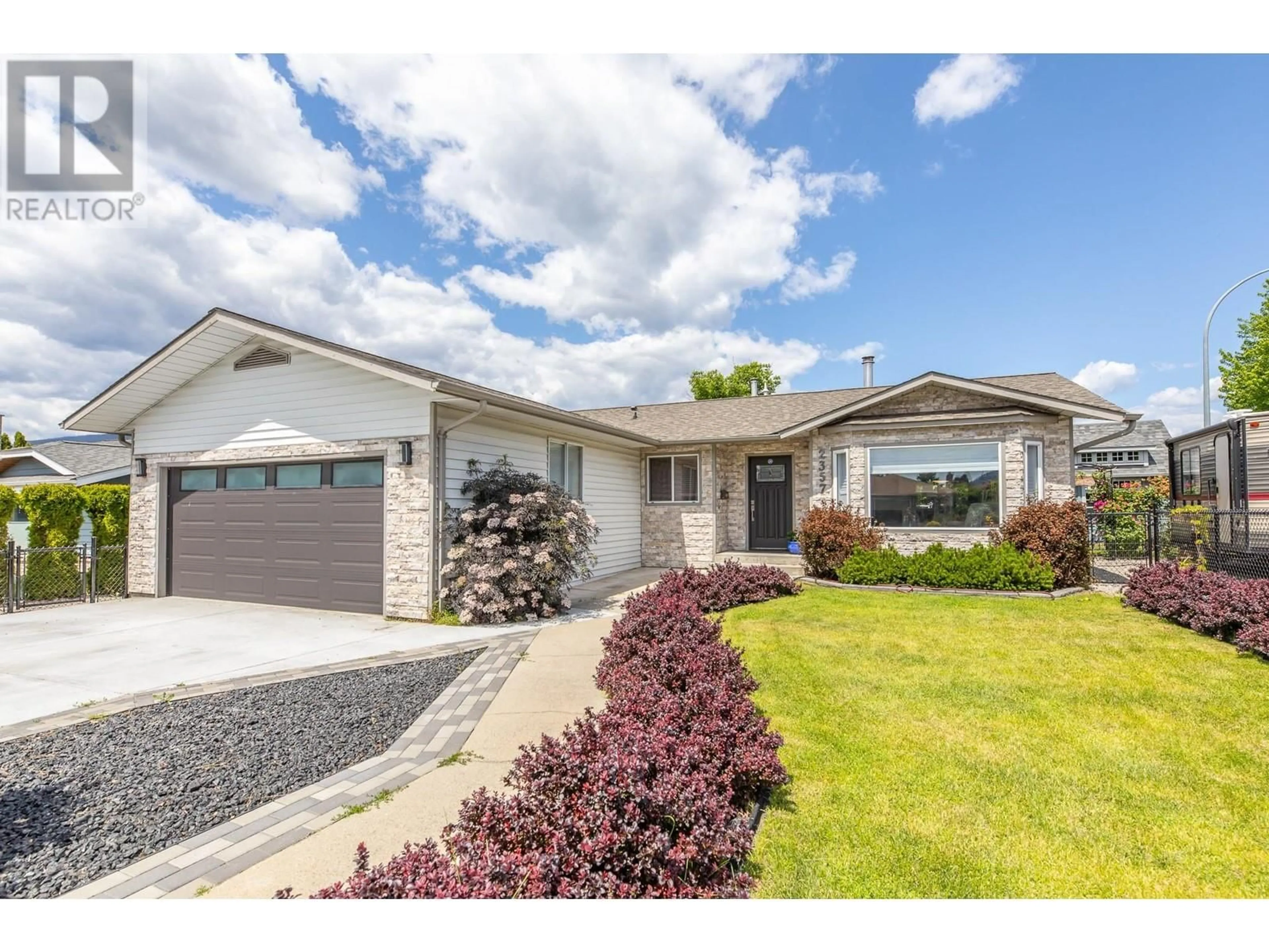 Home with vinyl exterior material, street for 2357 CORNWALL DRIVE, Penticton British Columbia V2A7T1