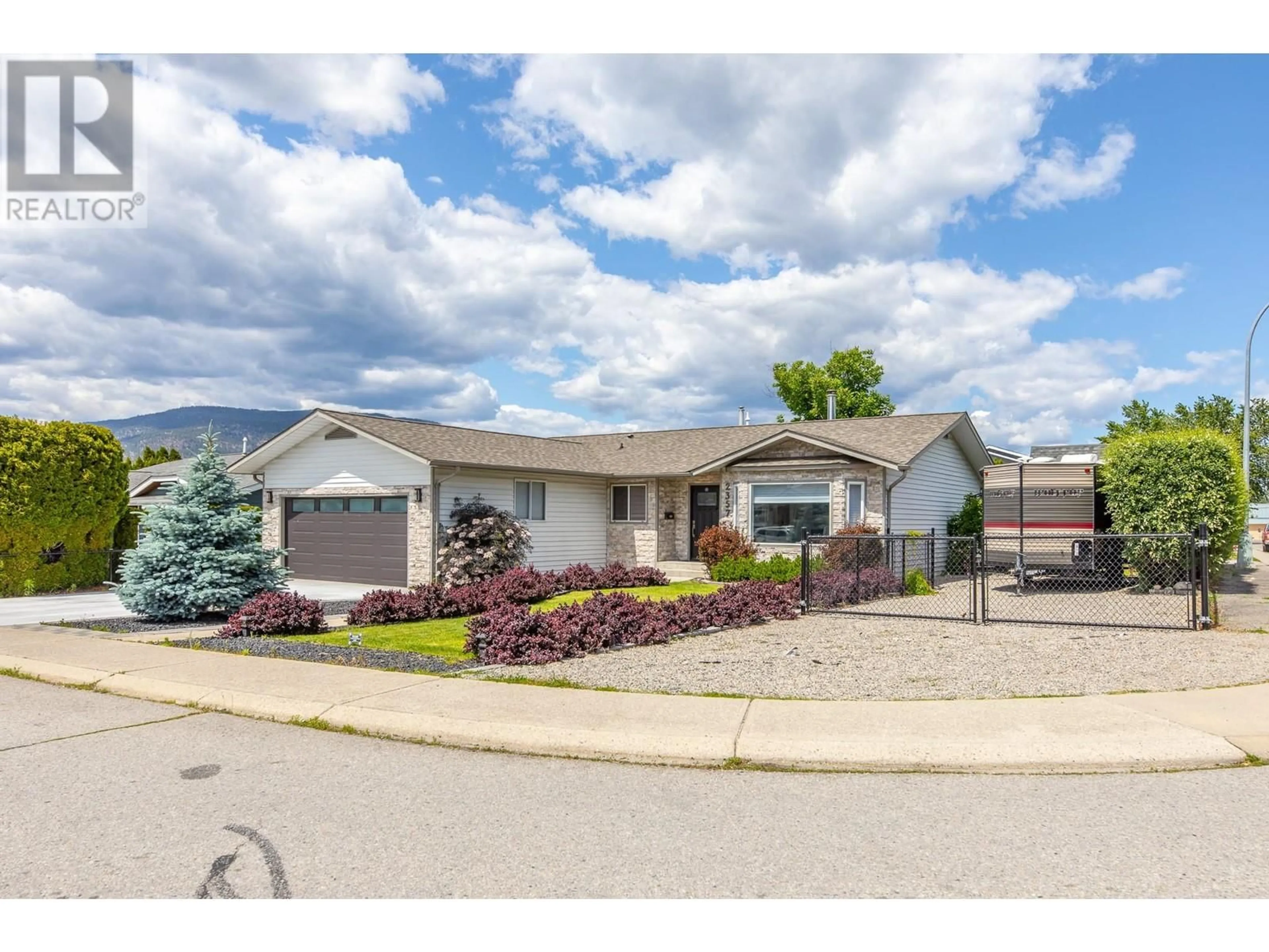 Home with vinyl exterior material, street for 2357 CORNWALL DRIVE, Penticton British Columbia V2A7T1
