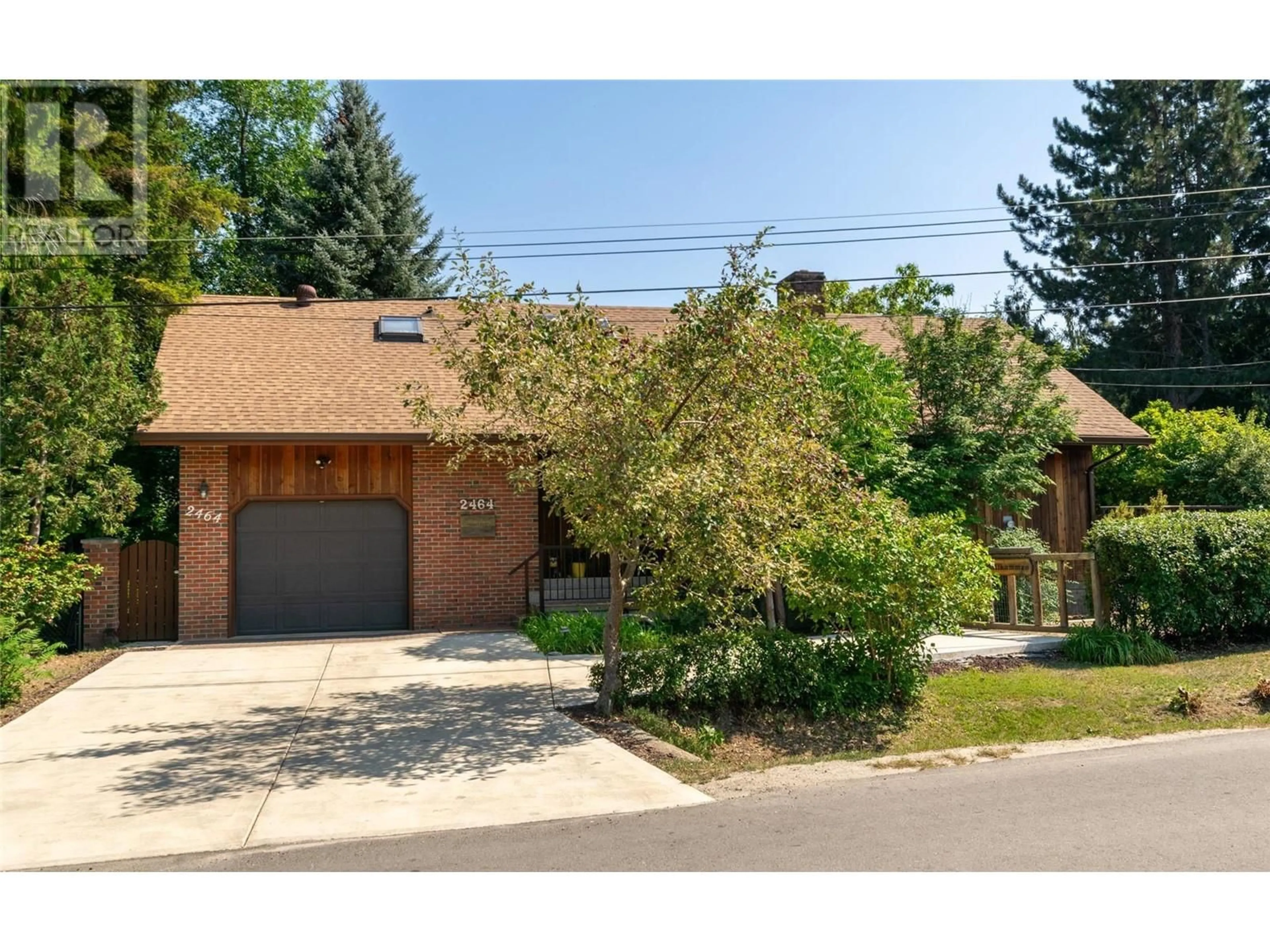 Home with brick exterior material, street for 2464 WAVERLY DRIVE, Blind Bay British Columbia V0E2W0
