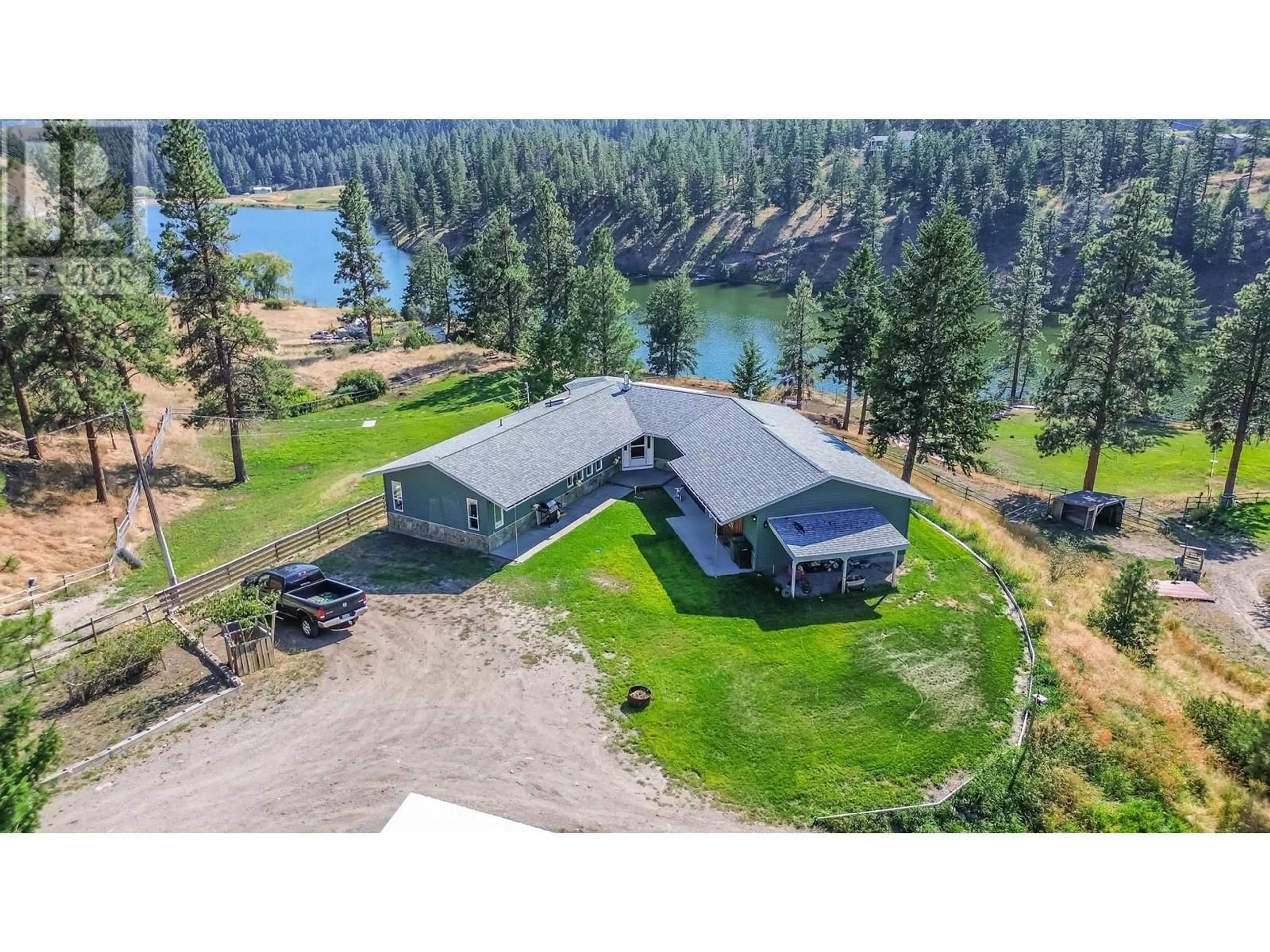 A pic from outside/outdoor area/front of a property/back of a property/a pic from drone, water/lake/river/ocean view for 232 FARLEIGH LAKE ROAD, Penticton British Columbia V2A0E6