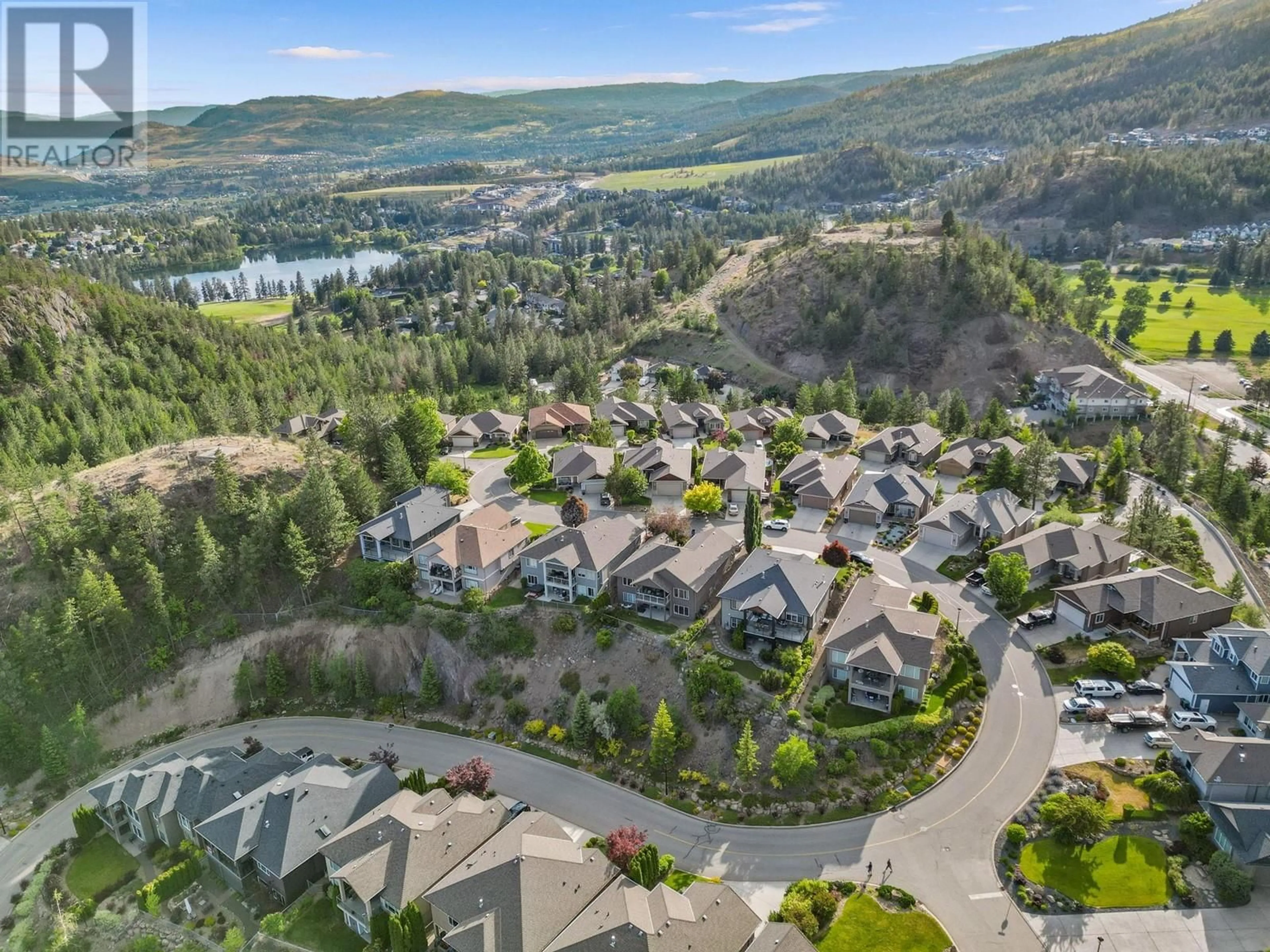 A pic from outside/outdoor area/front of a property/back of a property/a pic from drone, mountain view for 2038 CORNERSTONE DRIVE, West Kelowna British Columbia V4T2Y3