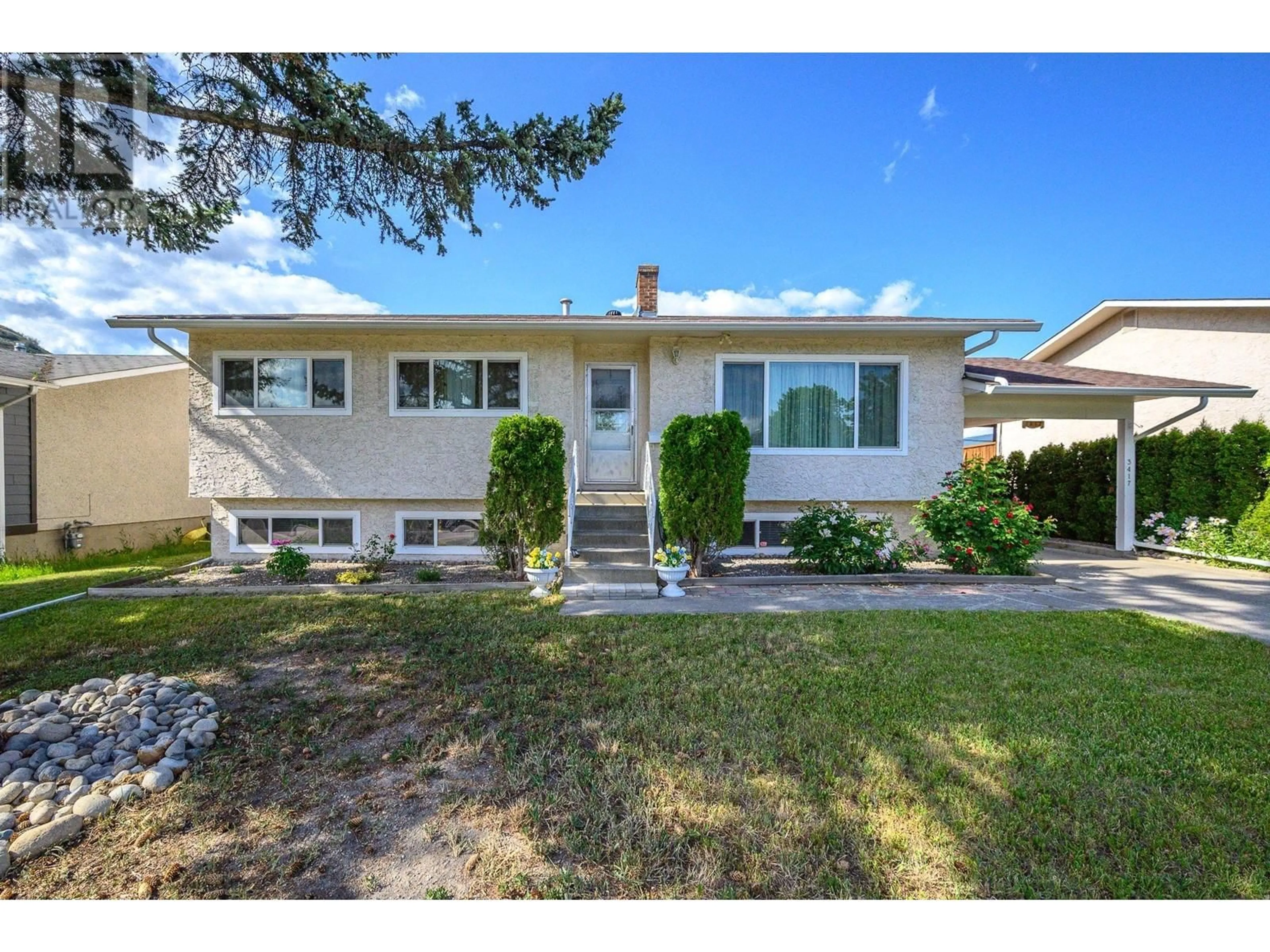 Home with vinyl exterior material, street for 3417 42 AVENUE, Vernon British Columbia V1T3J7