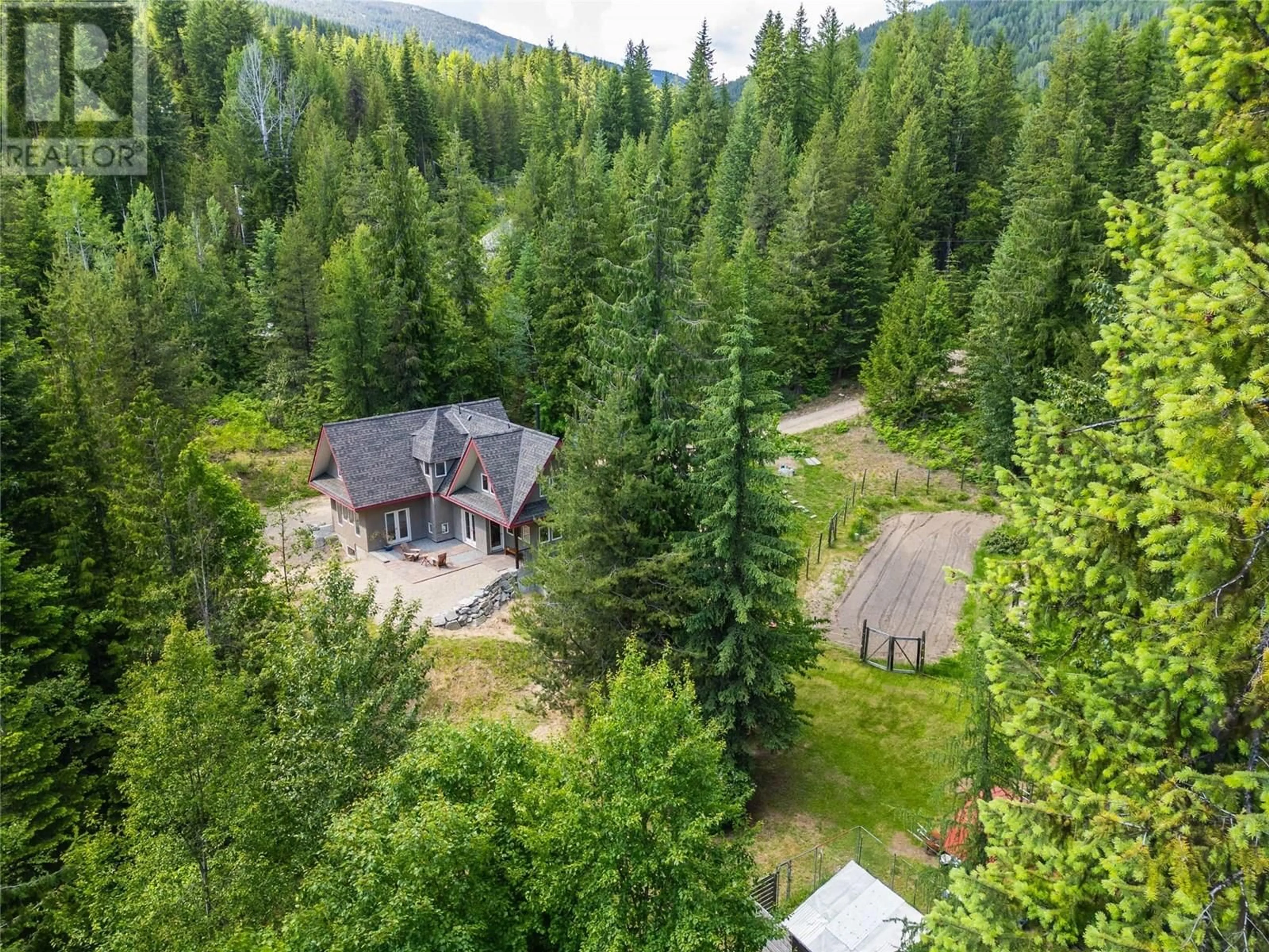 A pic from outside/outdoor area/front of a property/back of a property/a pic from drone, forest/trees view for 3675 THOMPSON ROAD, Bonnington Falls British Columbia V0G2G3