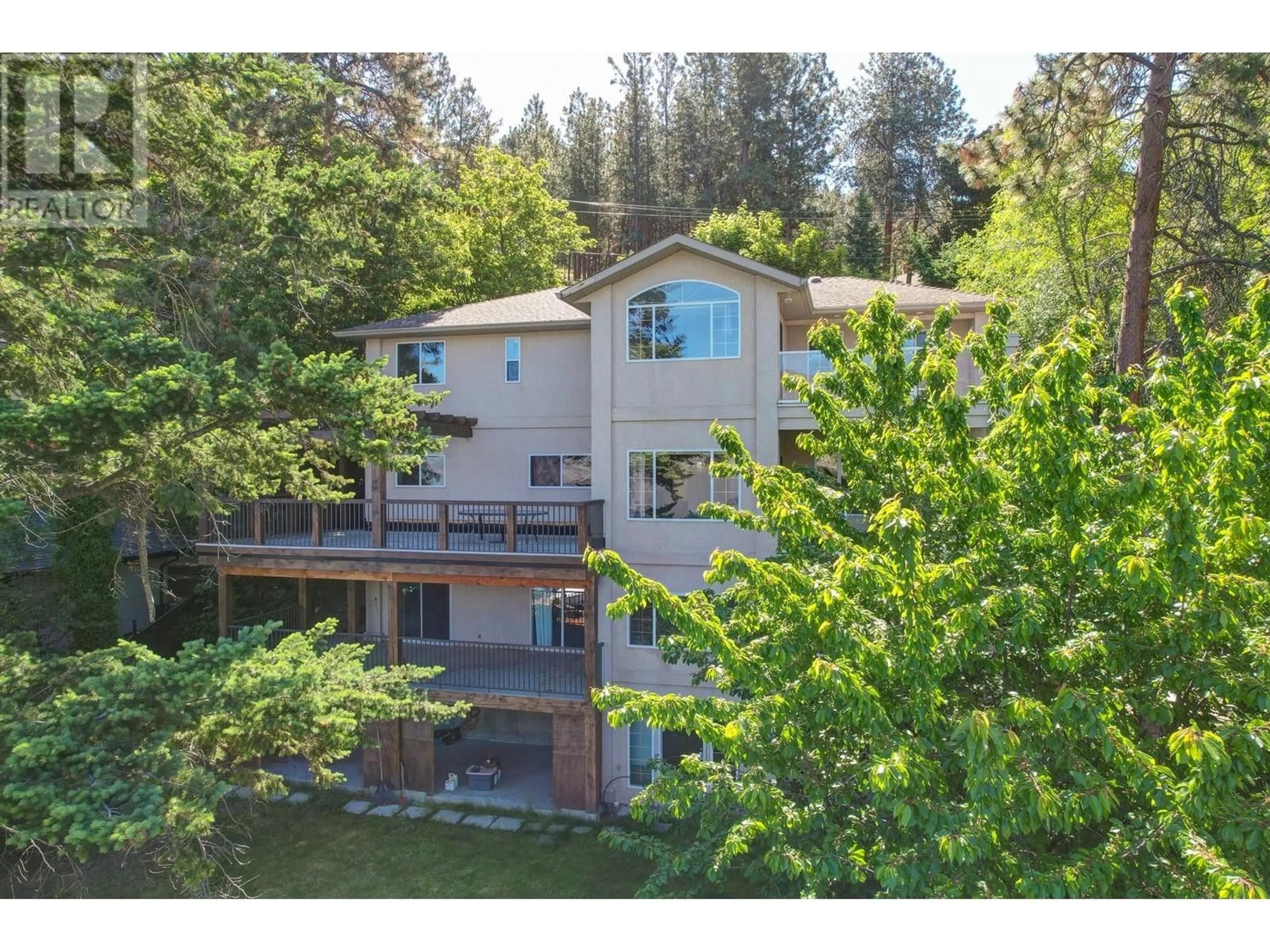 A pic from outside/outdoor area/front of a property/back of a property/a pic from drone, unknown for 2500 DUBBIN ROAD, Kelowna British Columbia V1V2B8