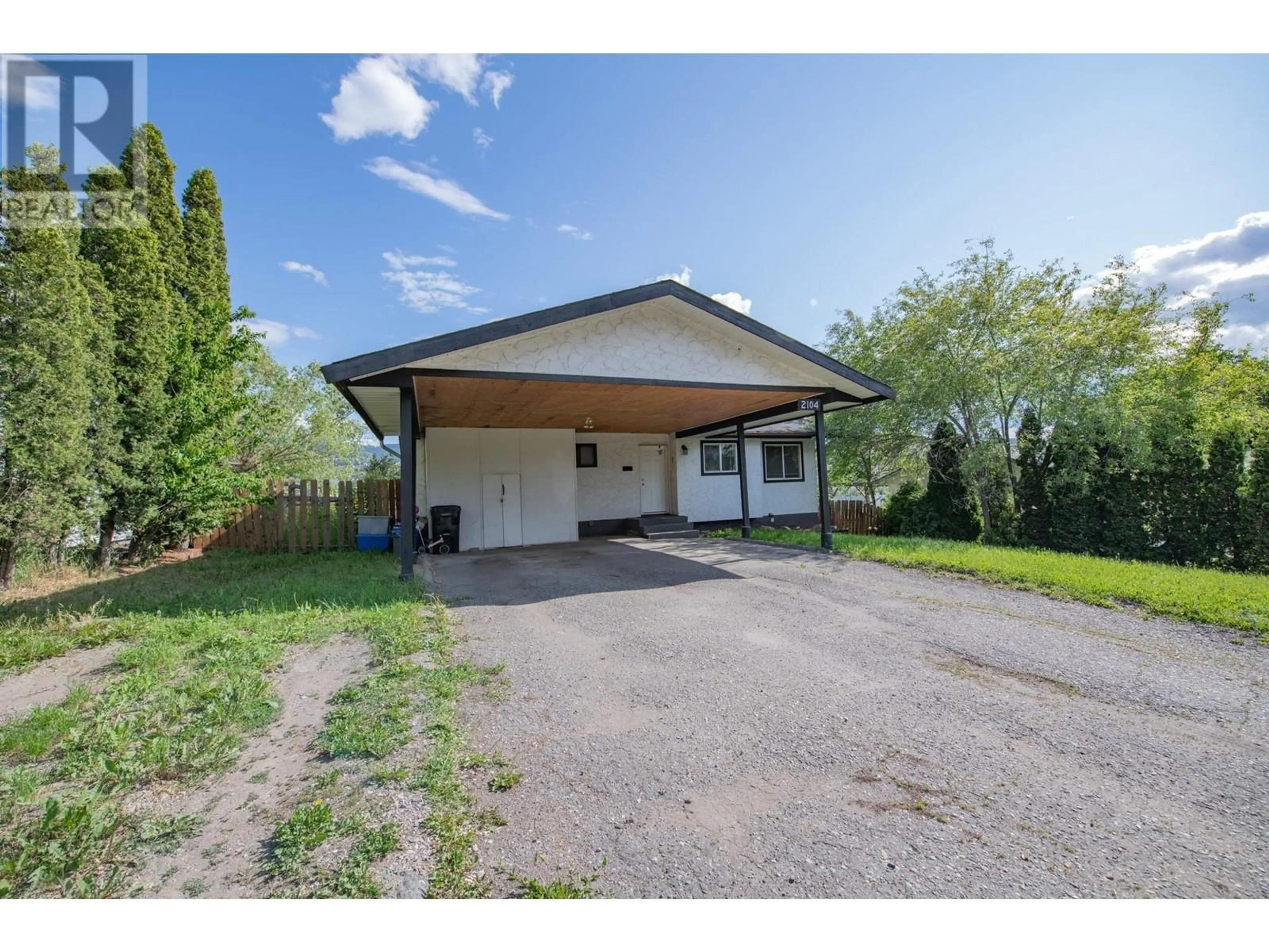 A pic from outside/outdoor area/front of a property/back of a property/a pic from drone, street for 2104 20 AVENUE, Vernon British Columbia V1T7J6