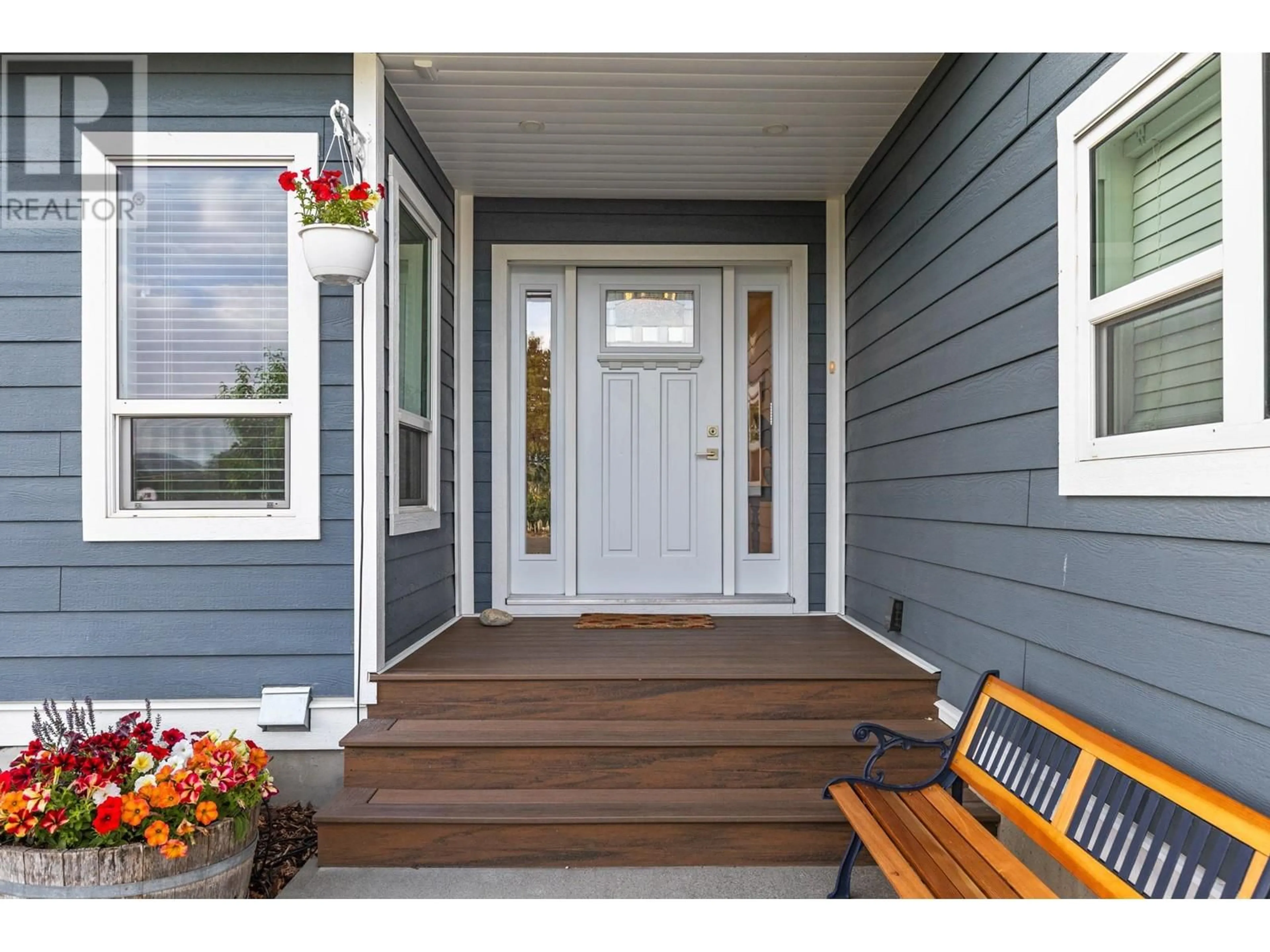 Home with vinyl exterior material, street for 7207 TUCELNUIT DRIVE, Oliver British Columbia V0H1T2