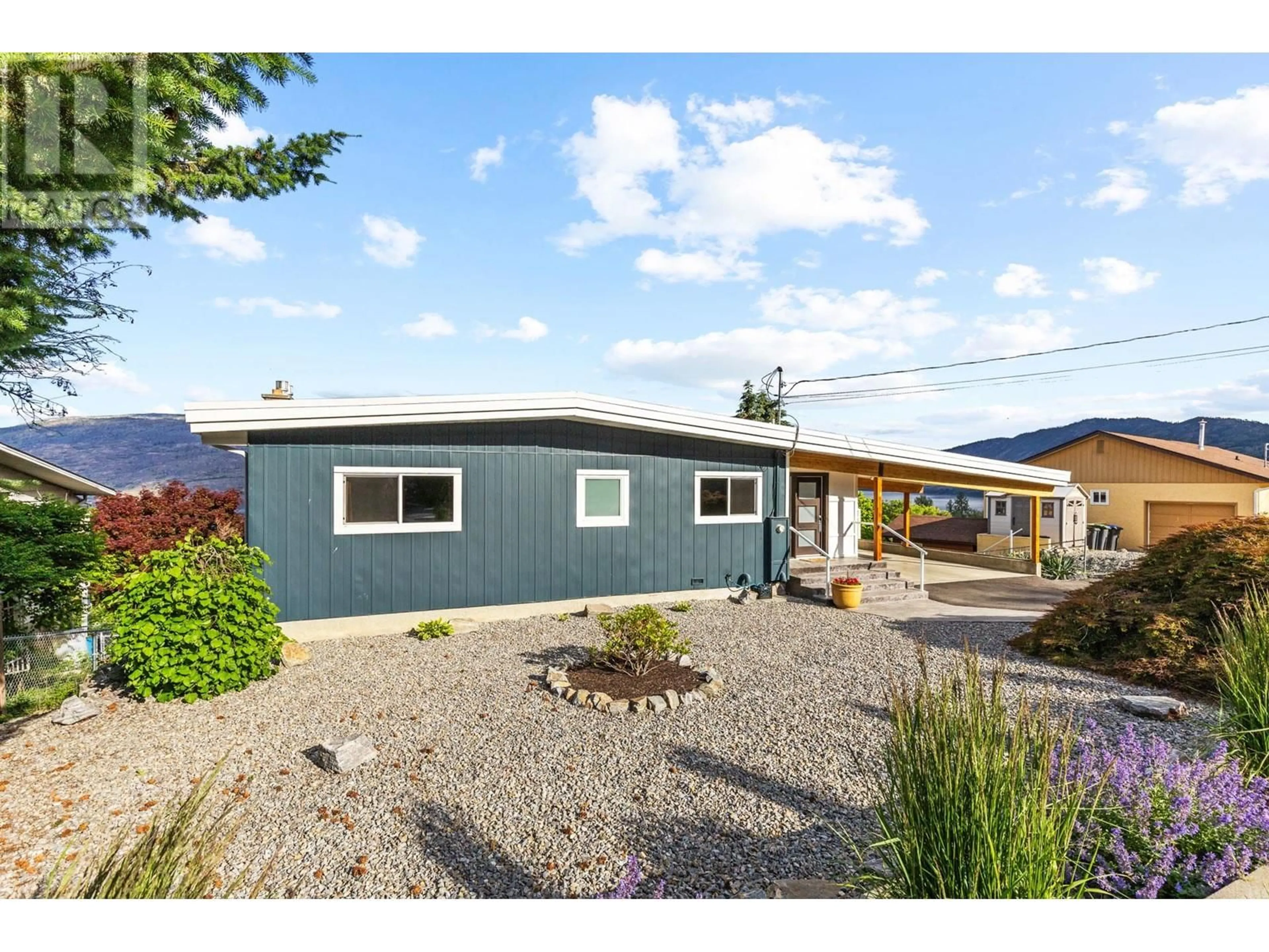 Home with vinyl exterior material, street for 6177 WILSON ROAD, Peachland British Columbia V0H1X7
