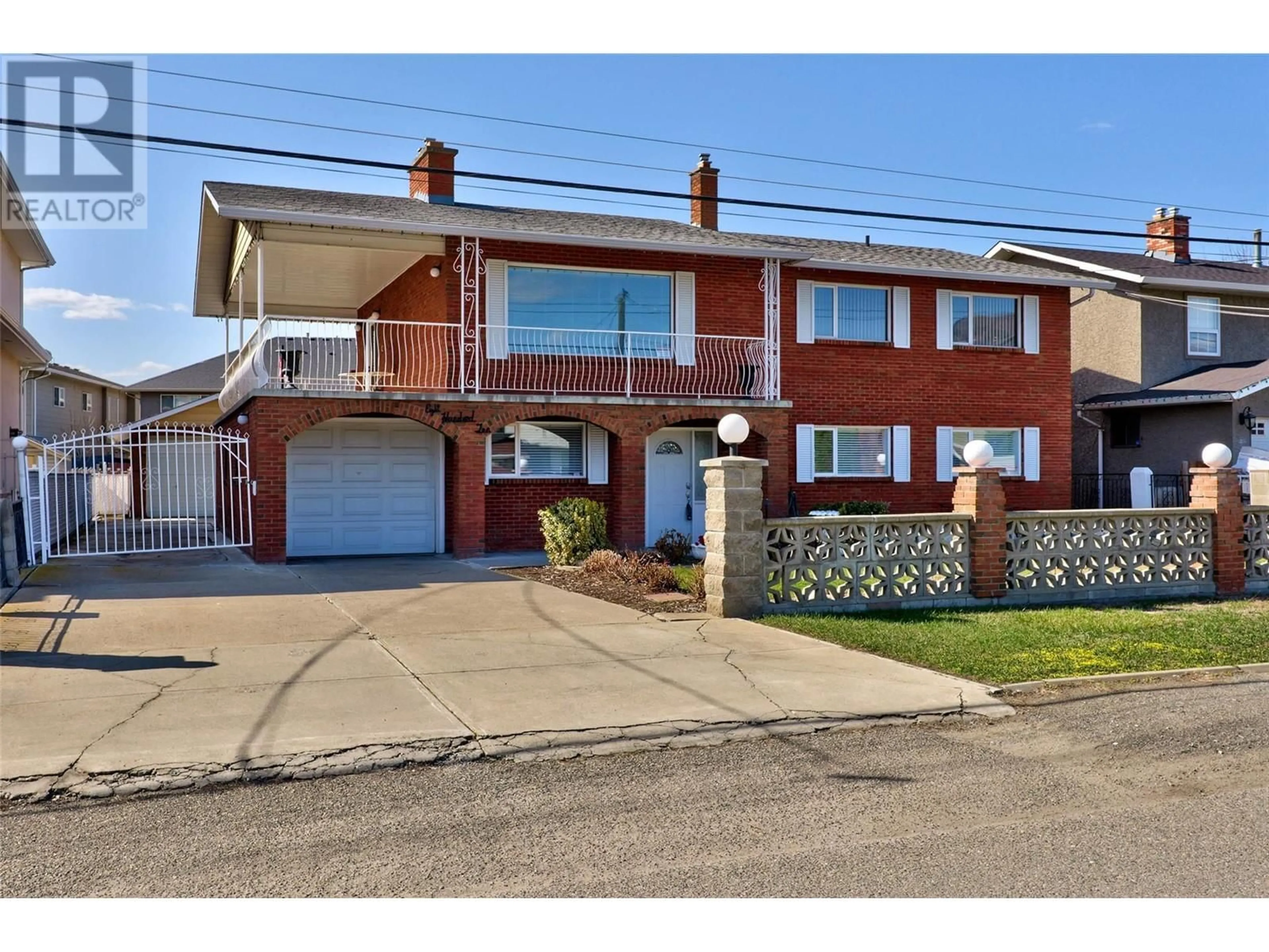 Home with brick exterior material, street for 810 OLLEK STREET, Kamloops British Columbia V2B5A9