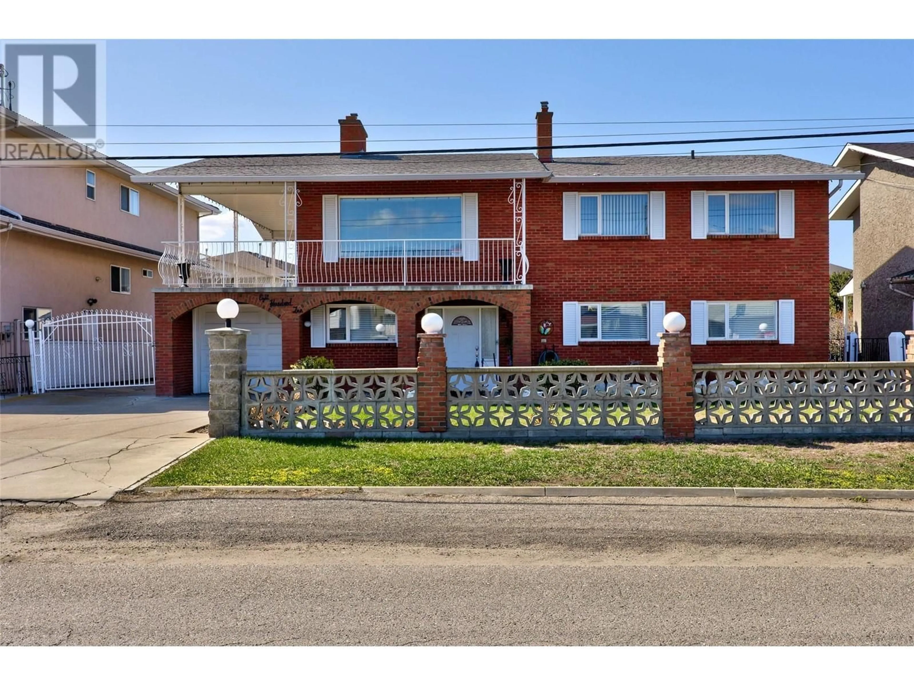 Home with brick exterior material, street for 810 OLLEK STREET, Kamloops British Columbia V2B5A9