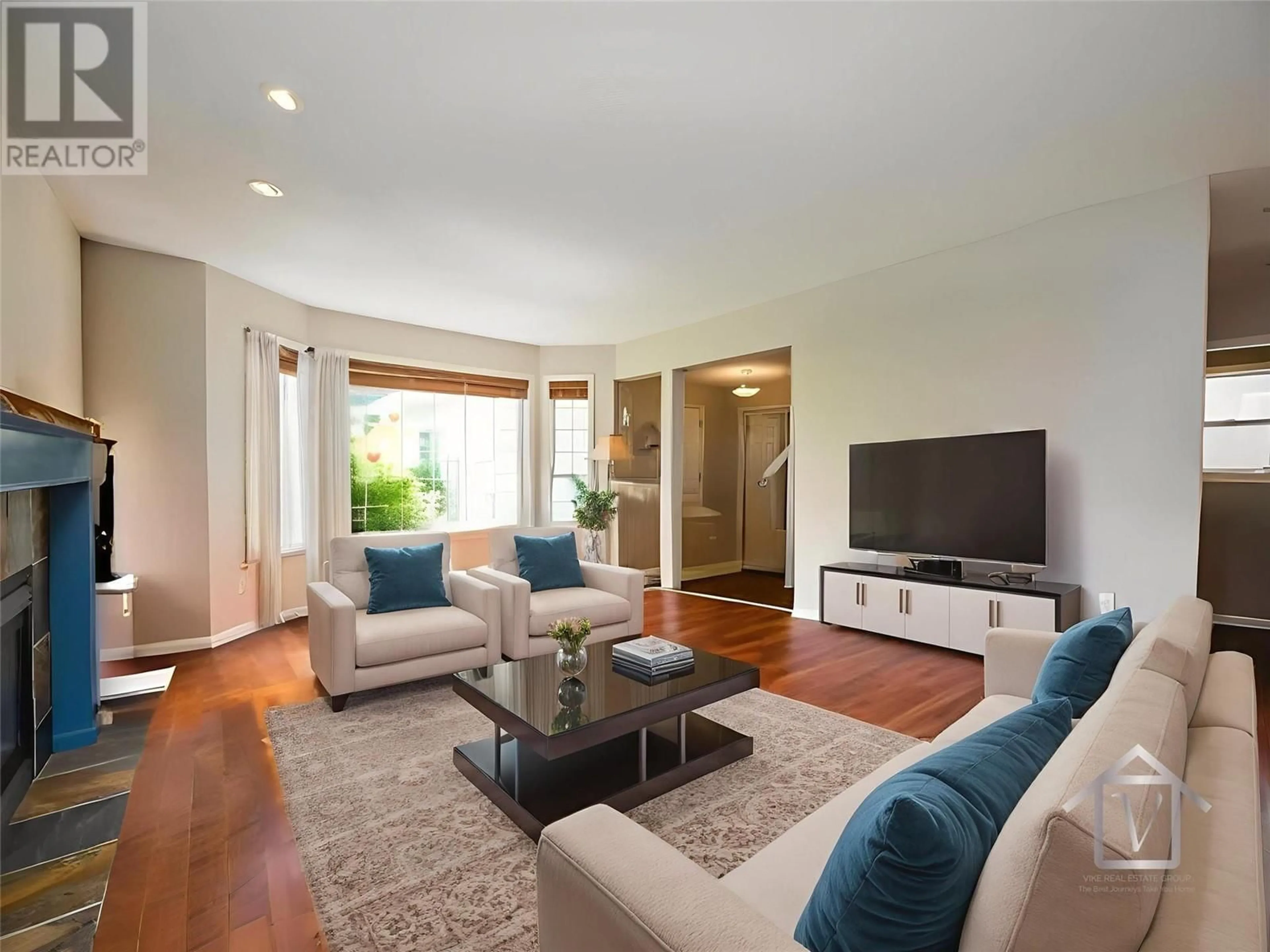 Living room with furniture, wood/laminate floor for 1923 FIR PLACE, Kamloops British Columbia V1S1X6
