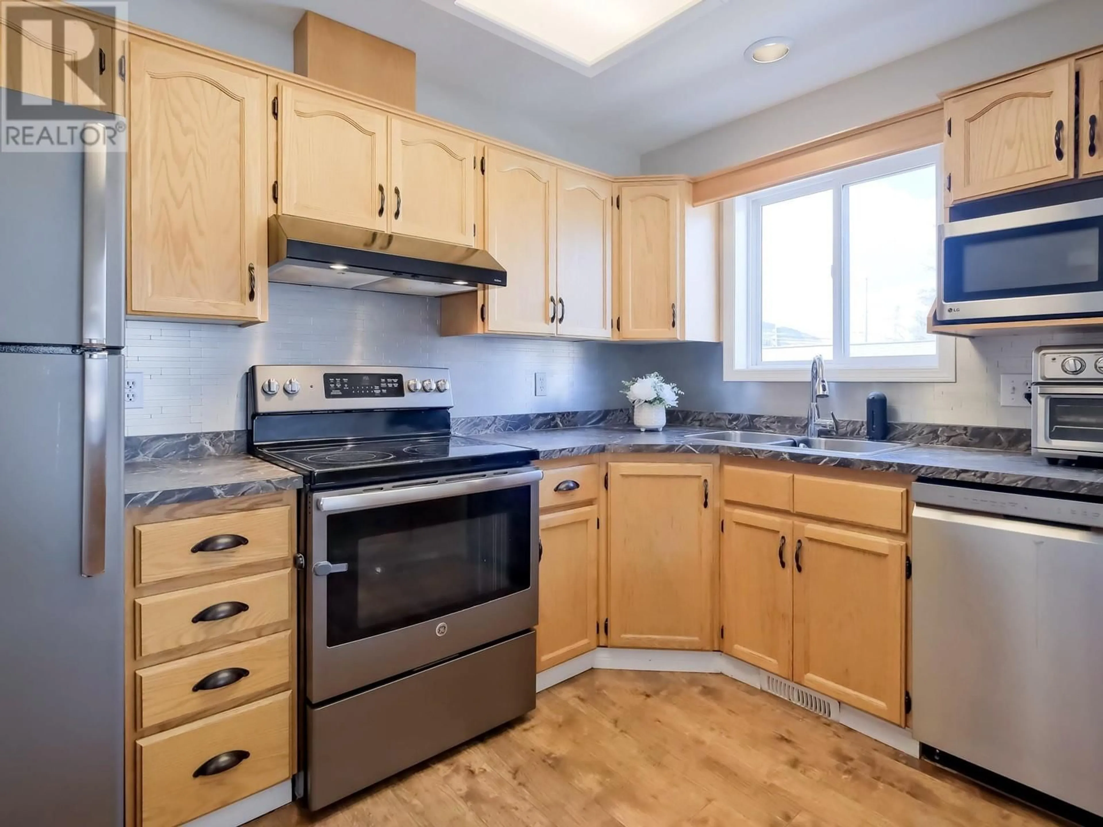 Standard kitchen, wood/laminate floor for 102 - 1414 GOVERNMENT STREET, Penticton British Columbia V2A4W1
