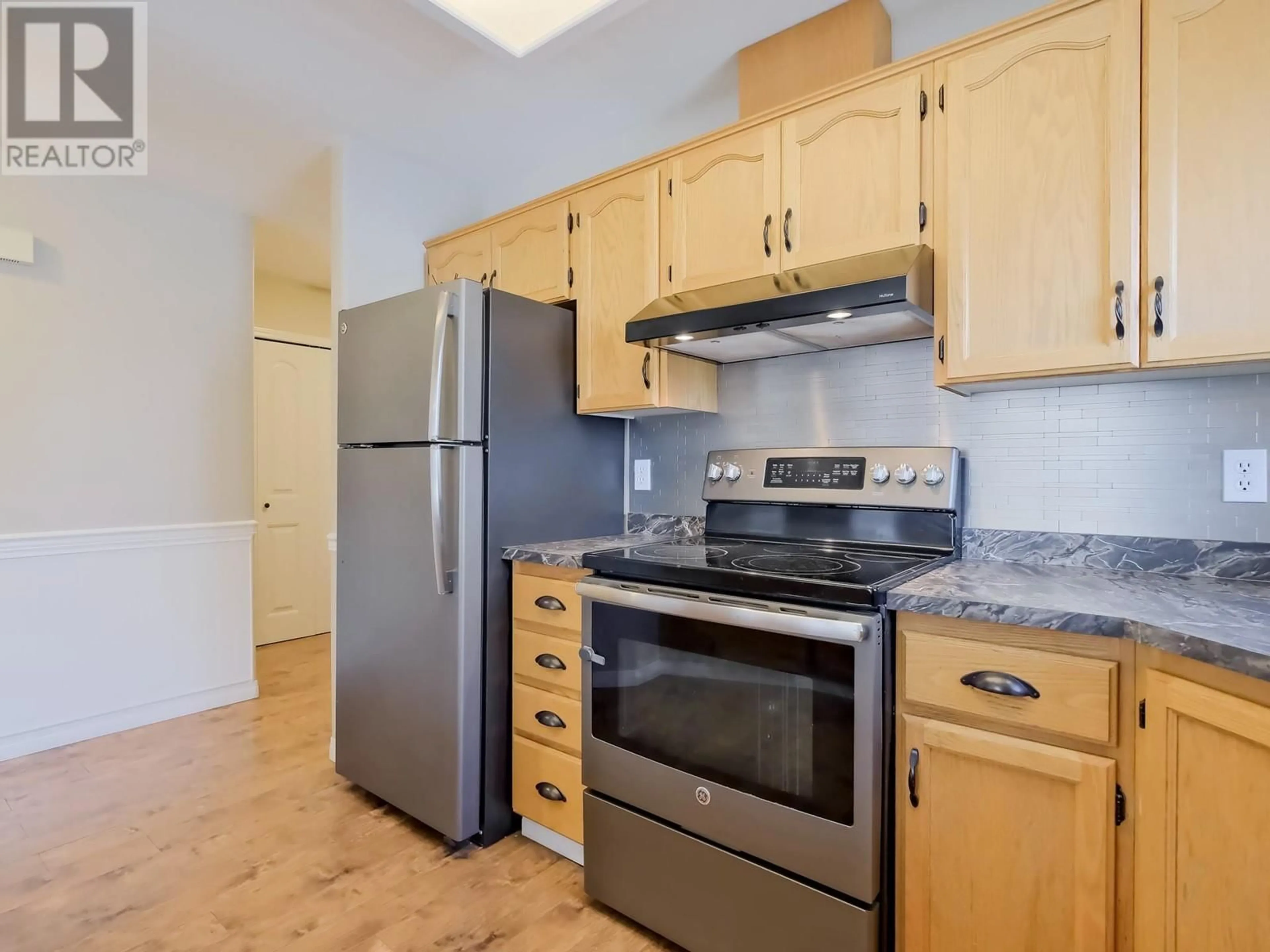 Standard kitchen, wood/laminate floor for 102 - 1414 GOVERNMENT STREET, Penticton British Columbia V2A4W1