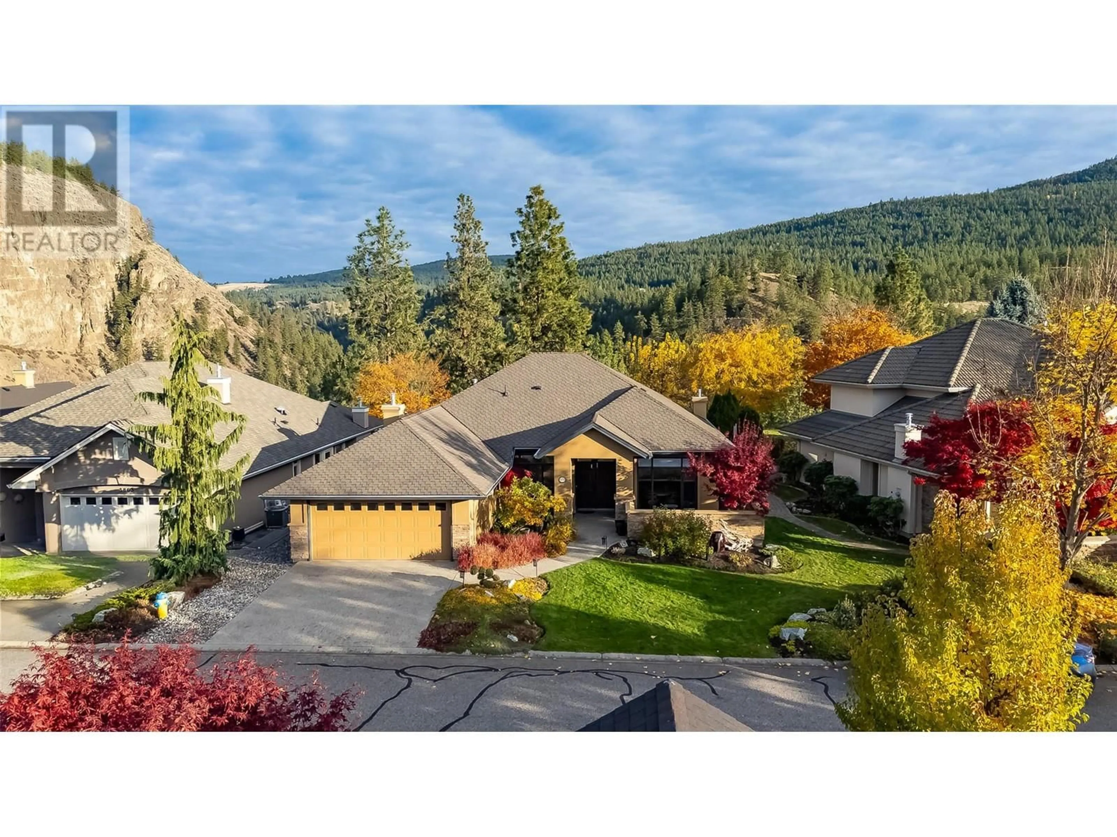 A pic from outside/outdoor area/front of a property/back of a property/a pic from drone, mountain view for 3869 GALLAGHERS PARKWAY, Kelowna British Columbia V1W3Z8
