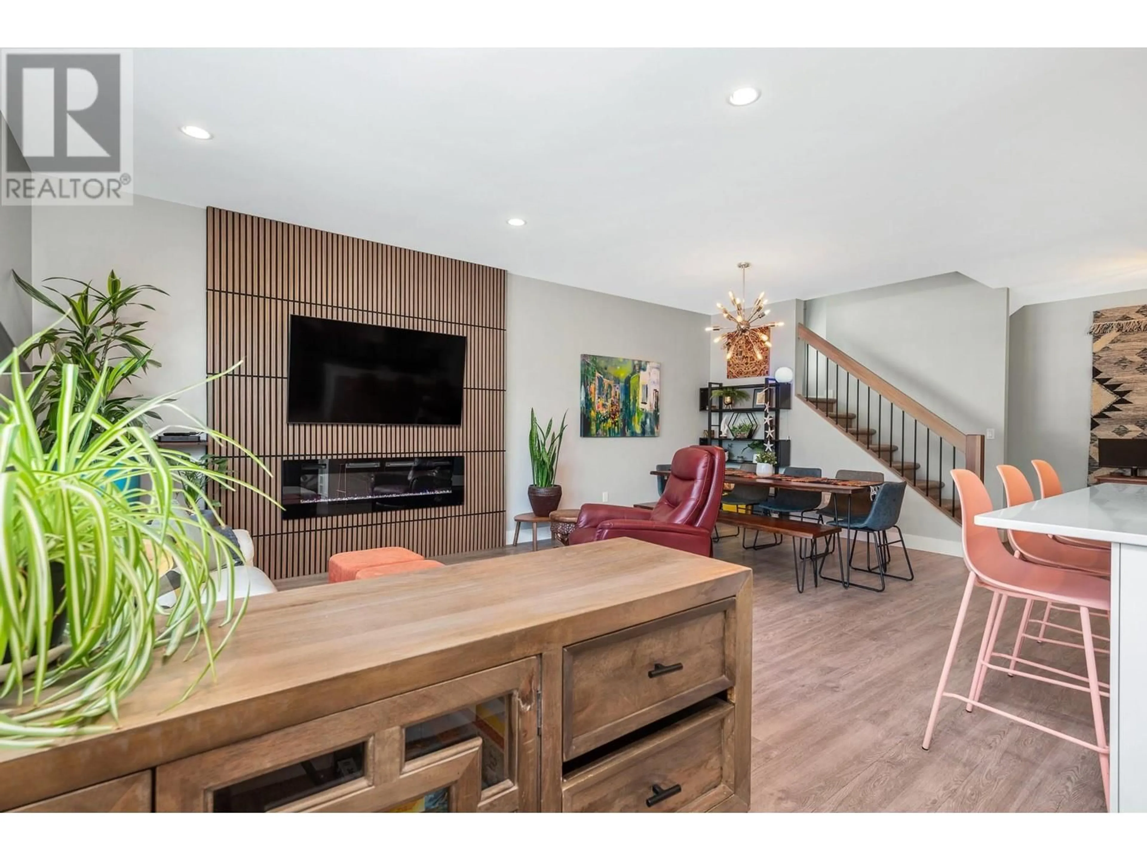Open concept kitchen, wood/laminate floor for 1 - 3910 26 STREET, Vernon British Columbia V1T4V4