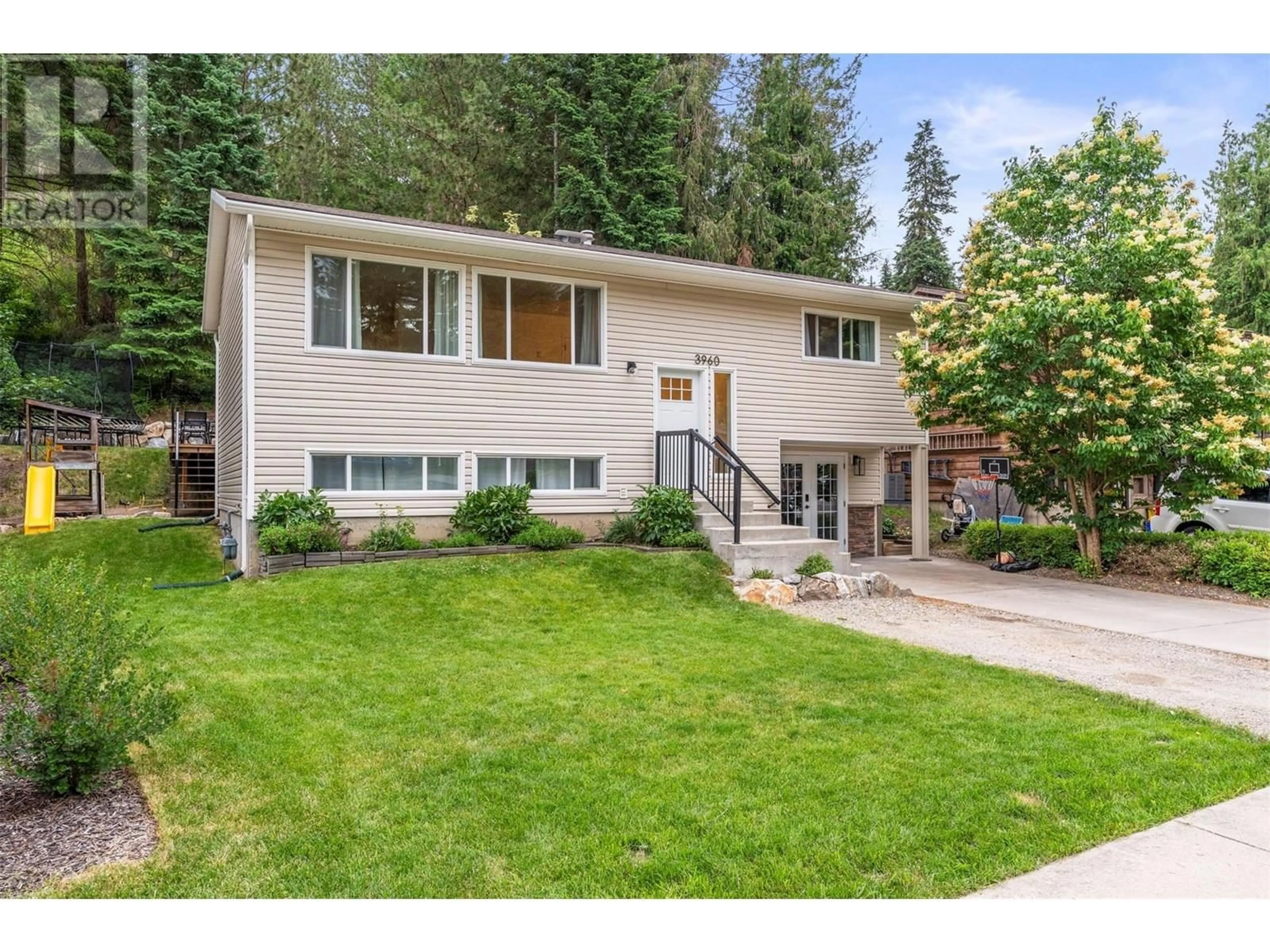Home with vinyl exterior material, street for 3960 HIGHLAND PARK DRIVE, Armstrong British Columbia V4Y0K2