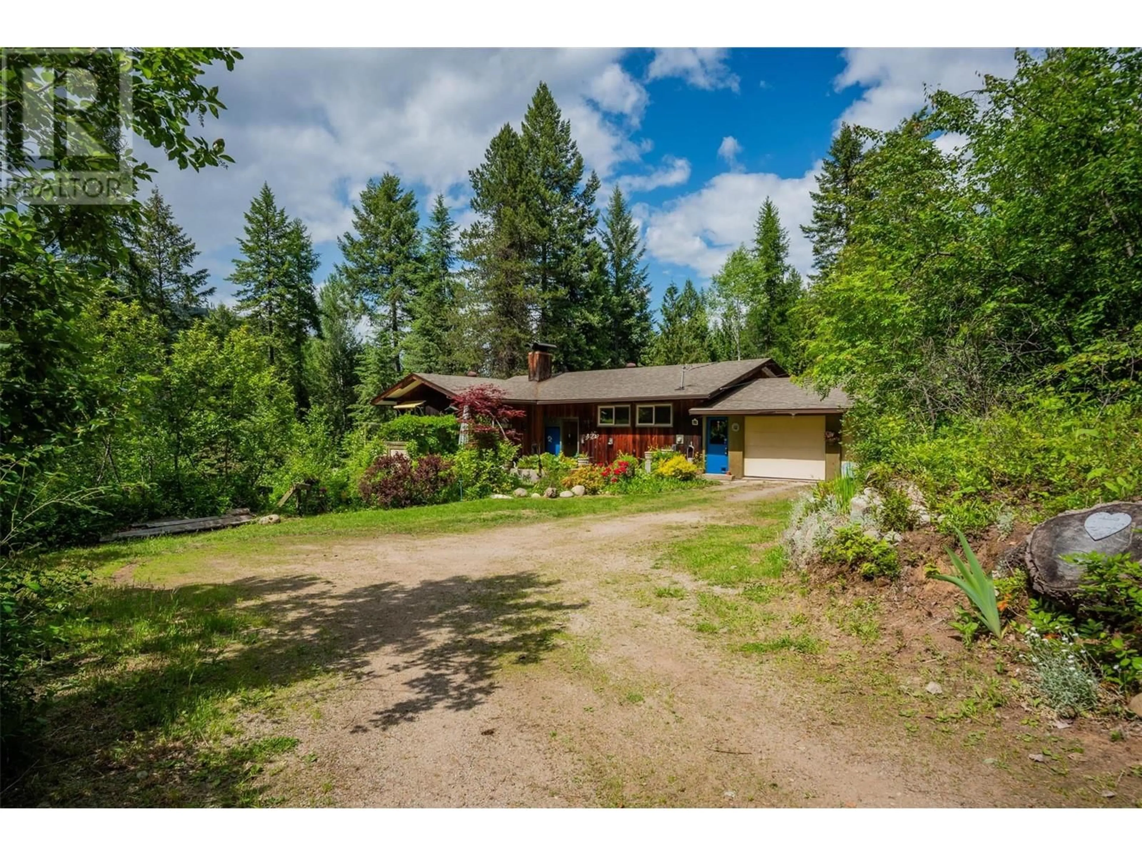 A pic from outside/outdoor area/front of a property/back of a property/a pic from drone, forest/trees view for 2083 GREEN ROAD, Fruitvale British Columbia V0G1L1