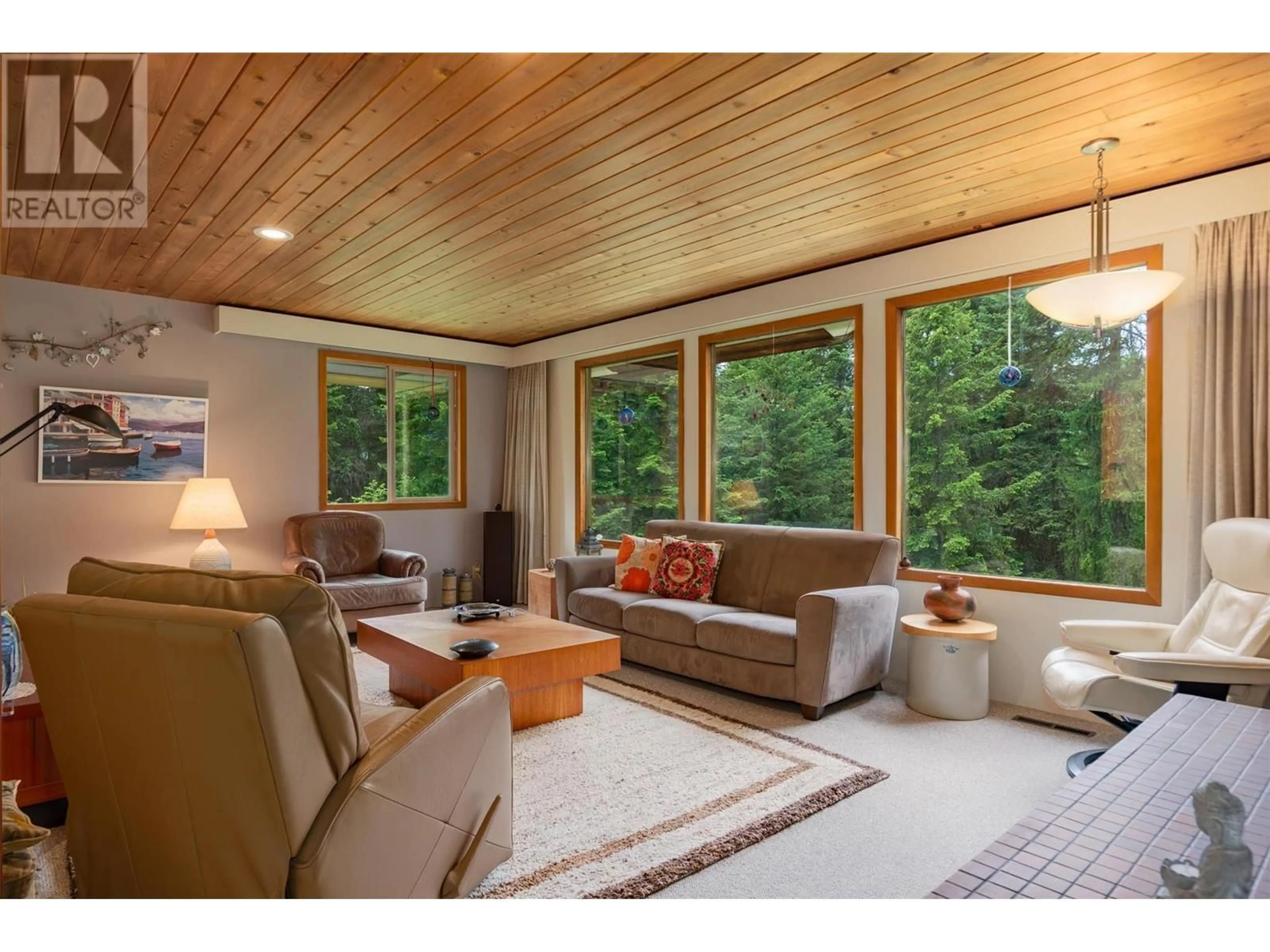 Living room with furniture, wood/laminate floor for 2083 GREEN ROAD, Fruitvale British Columbia V0G1L1