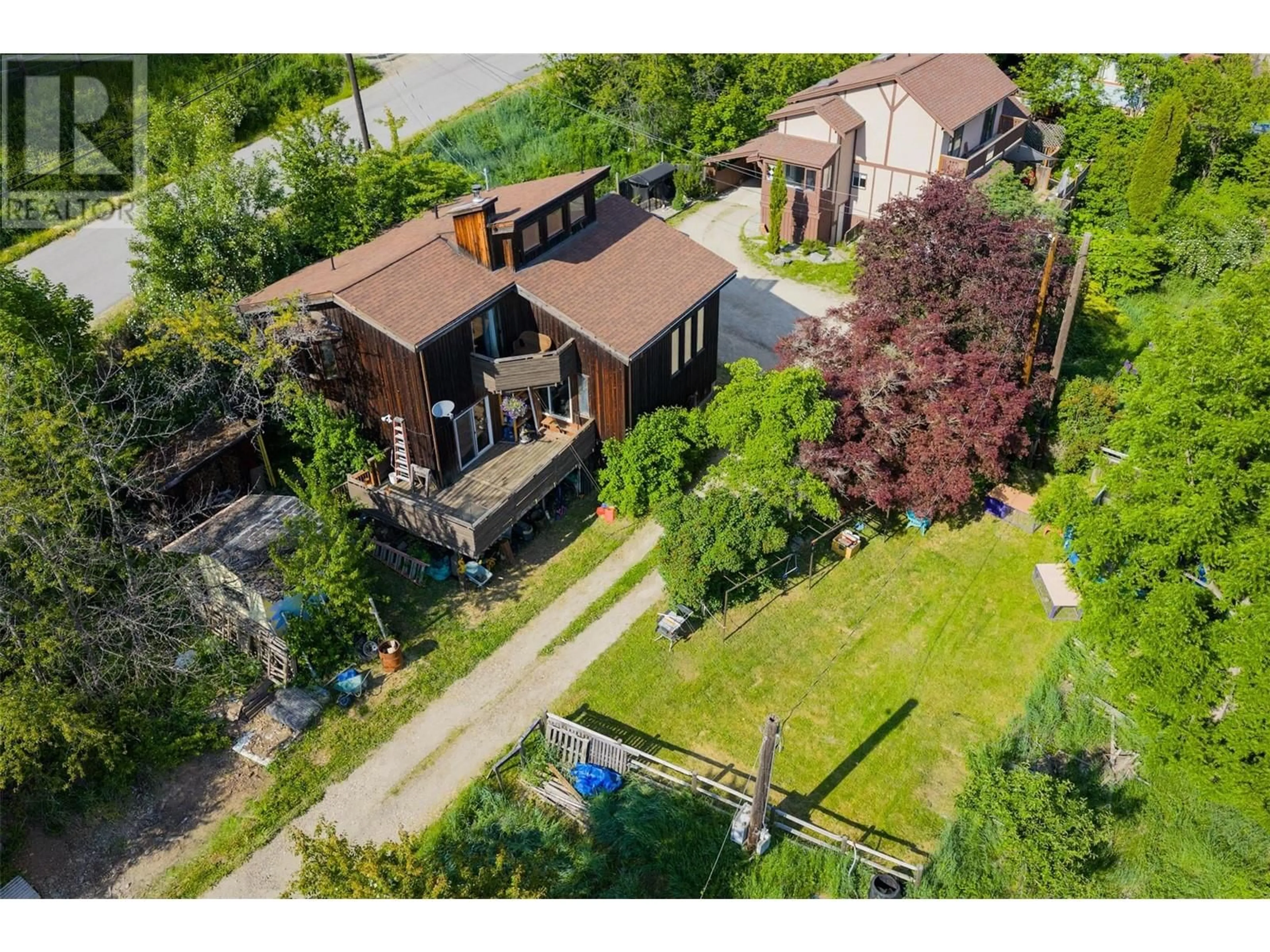 A pic from outside/outdoor area/front of a property/back of a property/a pic from drone, street for 3216 SOUTH SLOCAN VILLAGE ROAD, South Slocan British Columbia V0G2G0