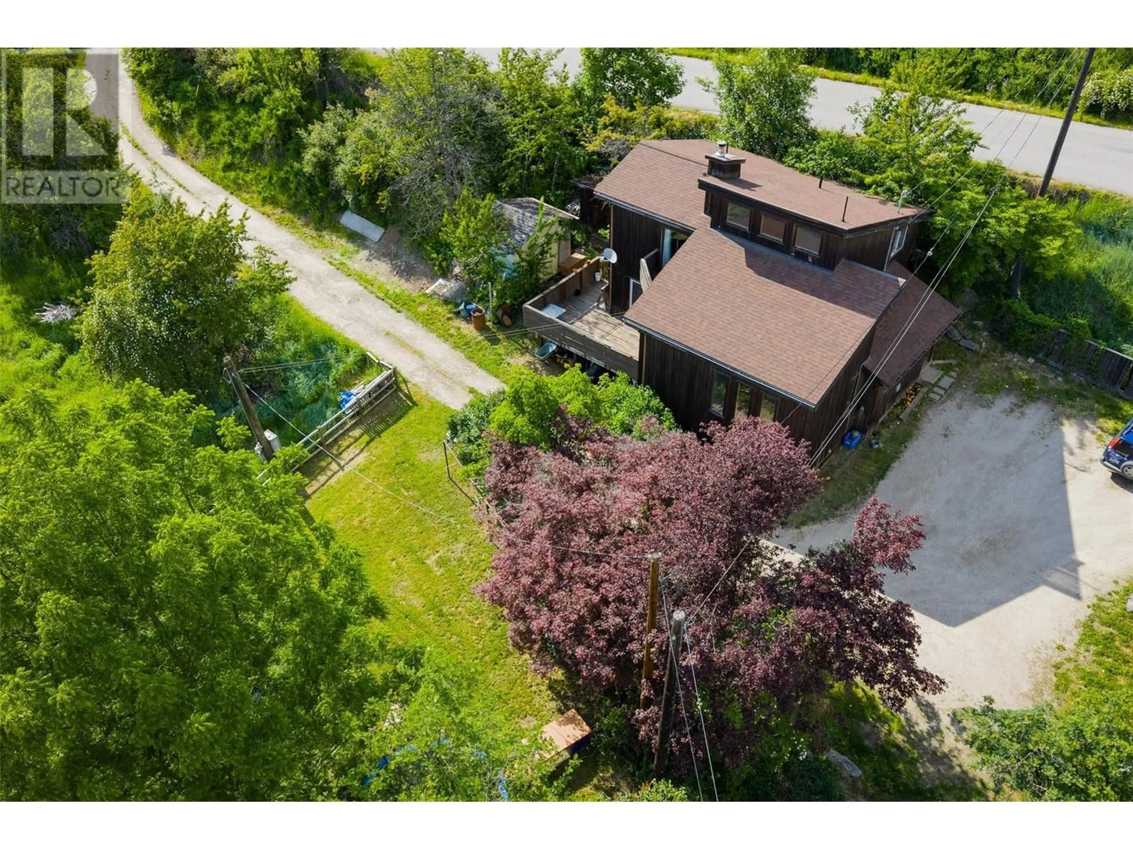 A pic from outside/outdoor area/front of a property/back of a property/a pic from drone, street for 3216 SOUTH SLOCAN VILLAGE ROAD, South Slocan British Columbia V0G2G0