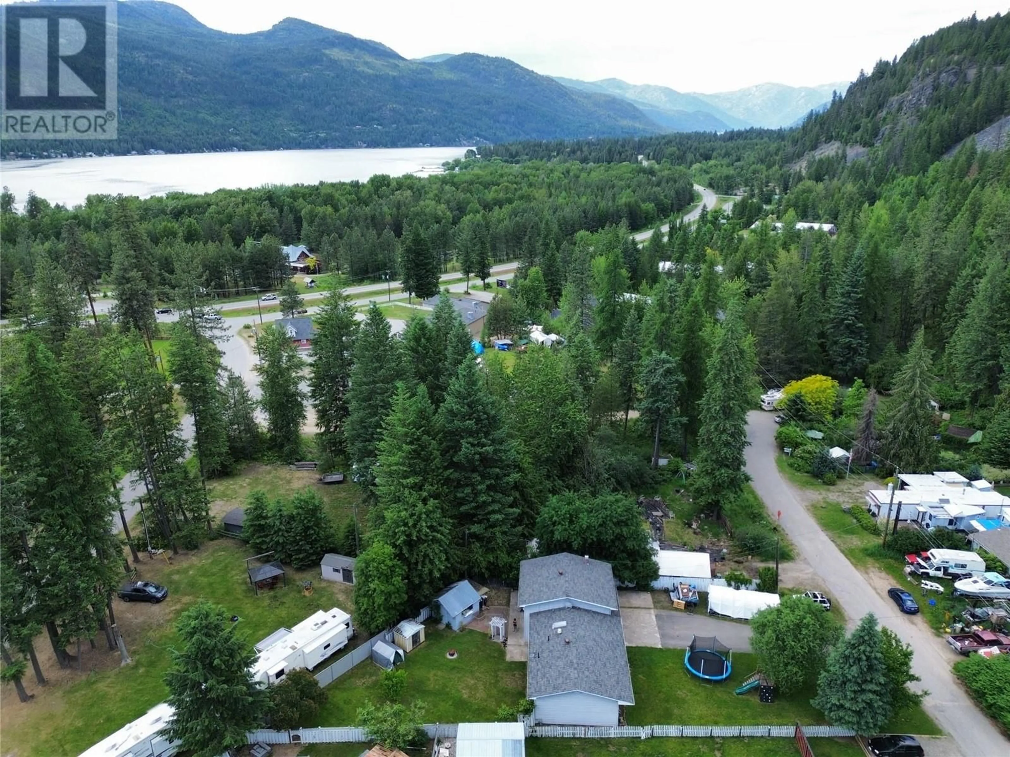 A pic from outside/outdoor area/front of a property/back of a property/a pic from drone, mountain view for 1675 CHANDLER ROAD, Christina Lake British Columbia V0H1E0