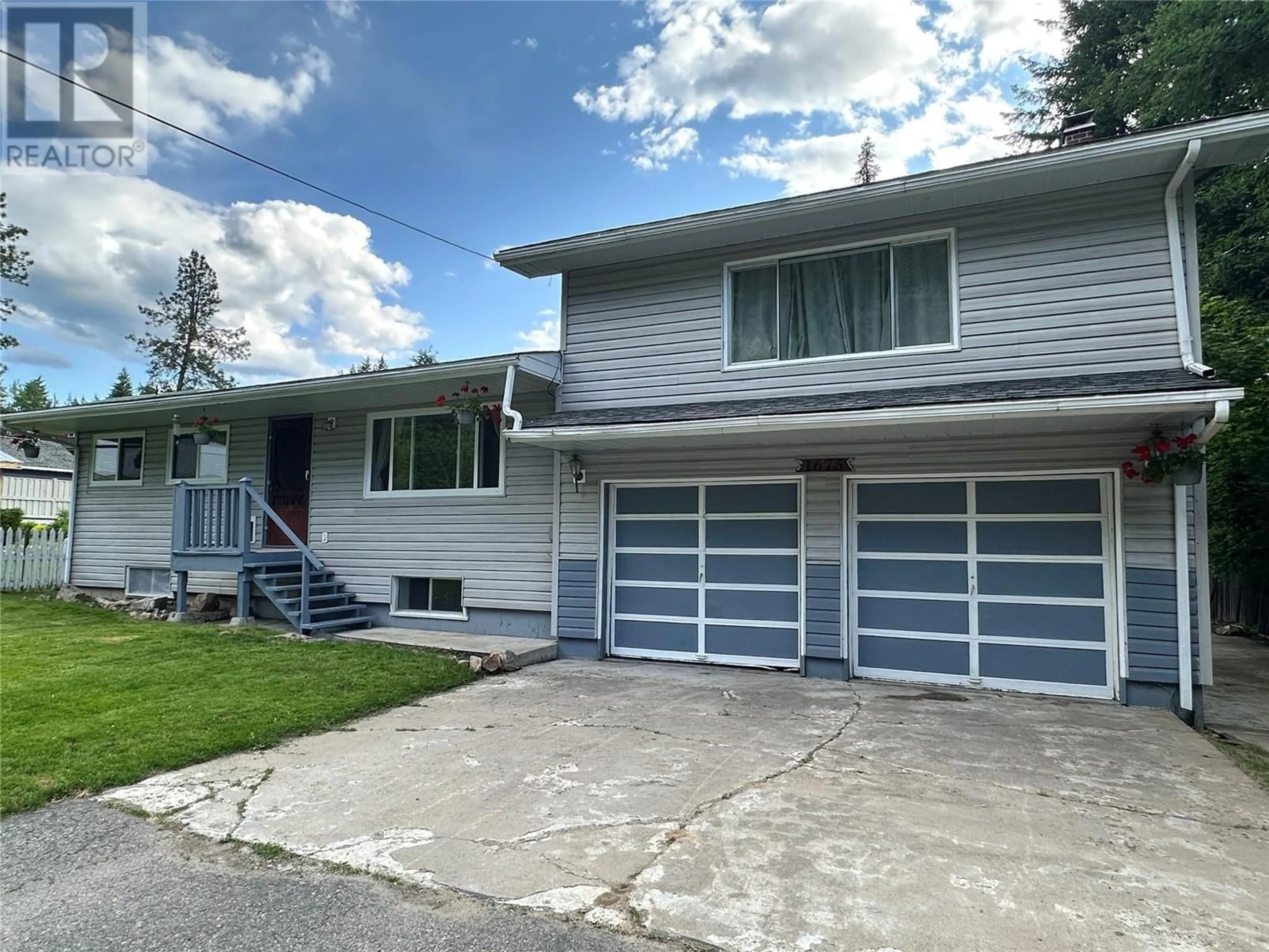Home with vinyl exterior material, street for 1675 CHANDLER ROAD, Christina Lake British Columbia V0H1E0
