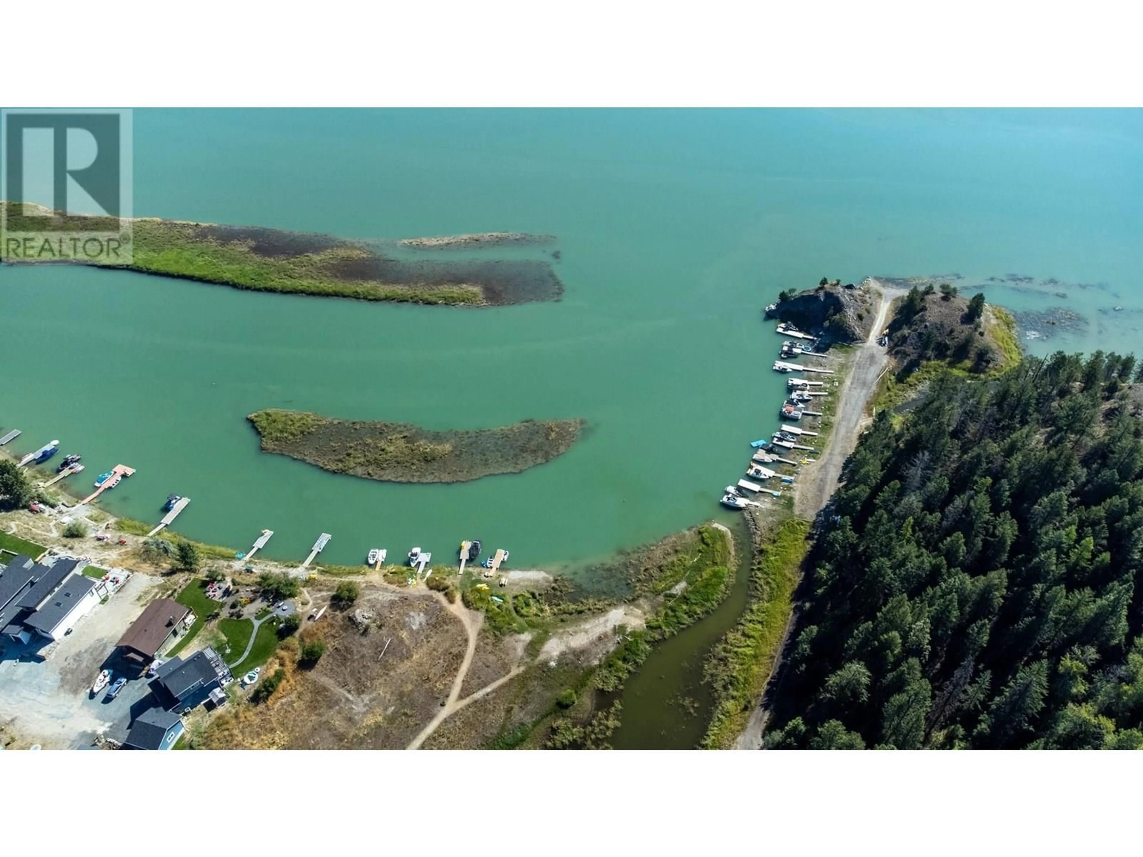 A pic from outside/outdoor area/front of a property/back of a property/a pic from drone, water/lake/river/ocean view for 9881 OSPREY LANDING DRIVE, Wardner British Columbia V0B2J0