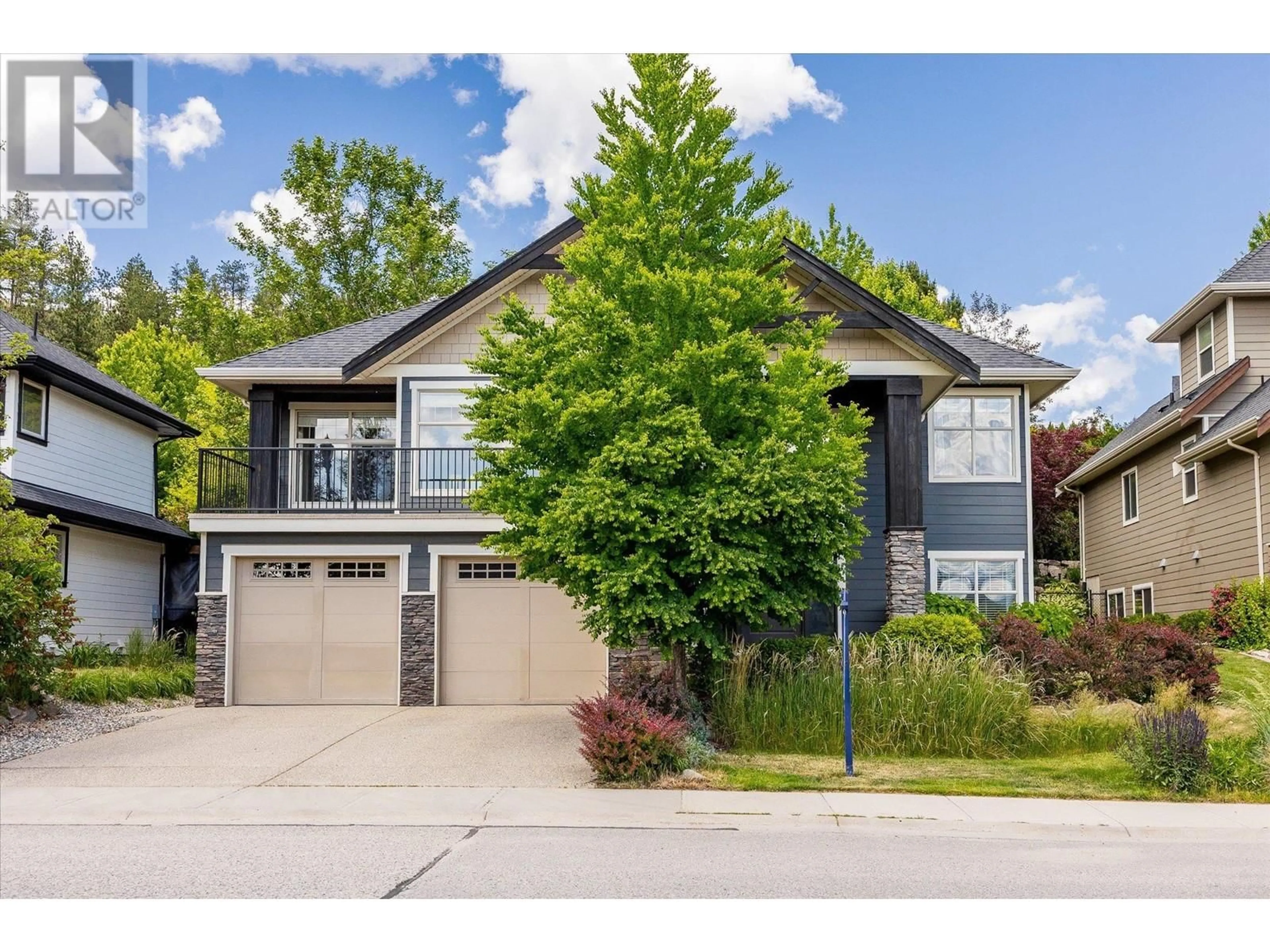 Home with vinyl exterior material, street for 1940 BEGBIE ROAD, Kelowna British Columbia V1V2X3