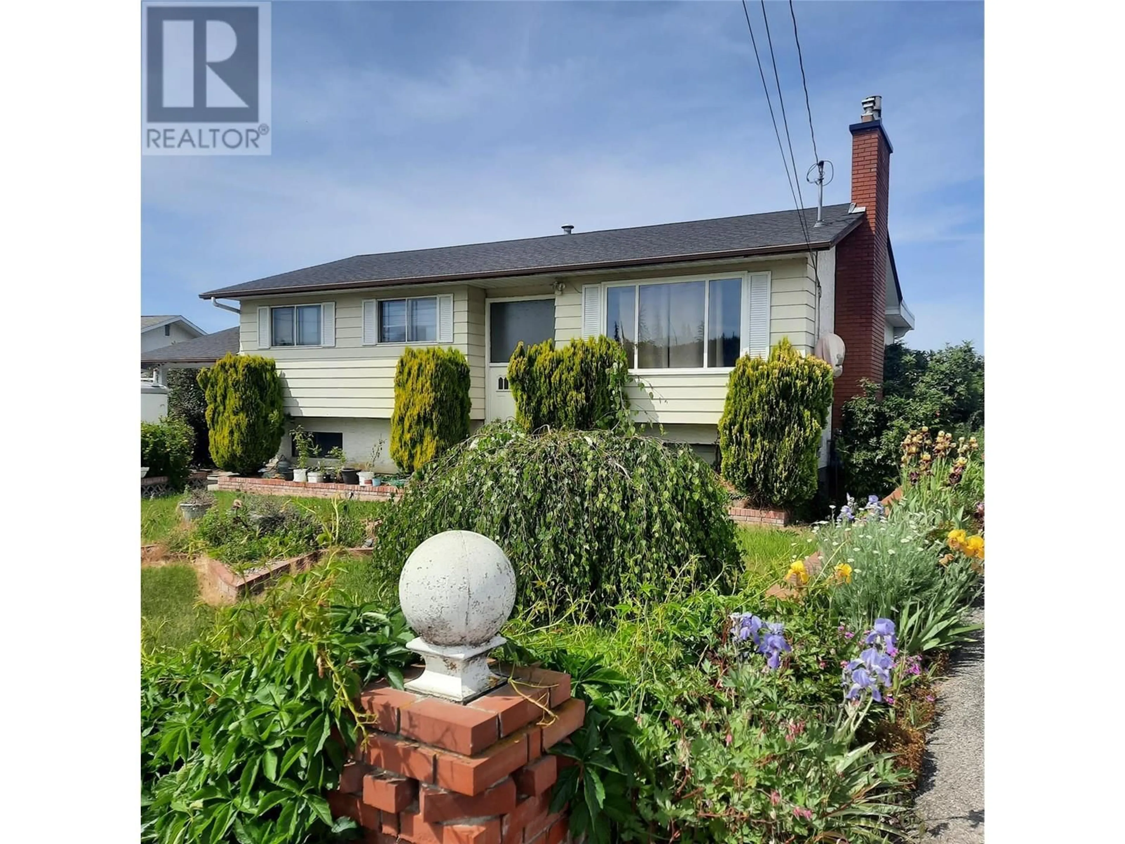 A pic from outside/outdoor area/front of a property/back of a property/a pic from drone, street for 540 MONTEREY ROAD, Rutland British Columbia V1X1A2